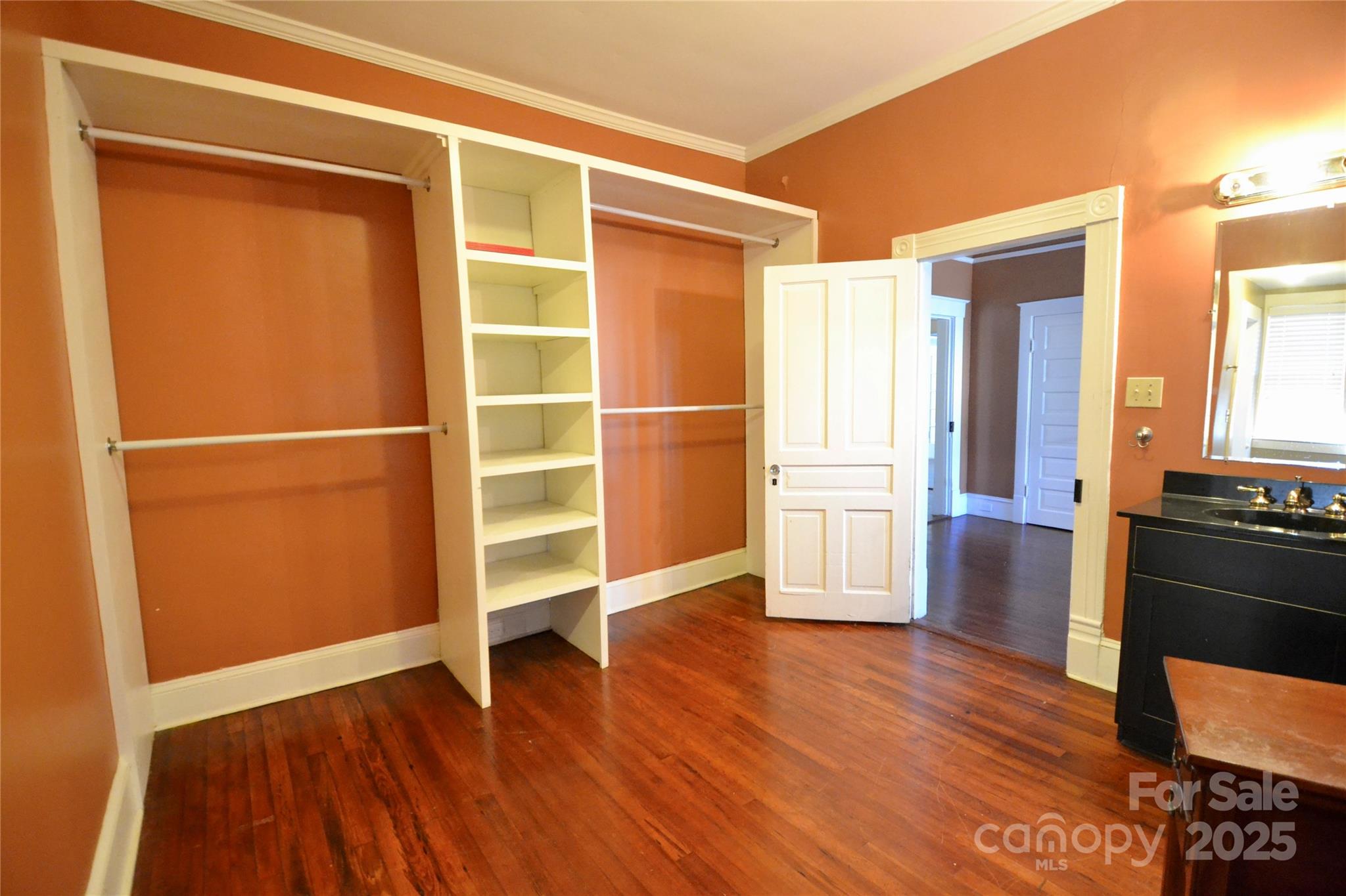 512 2nd Street Spencer, NC 28159 - Photo 20 of 33 a view of an empty room with a window and wooden floor