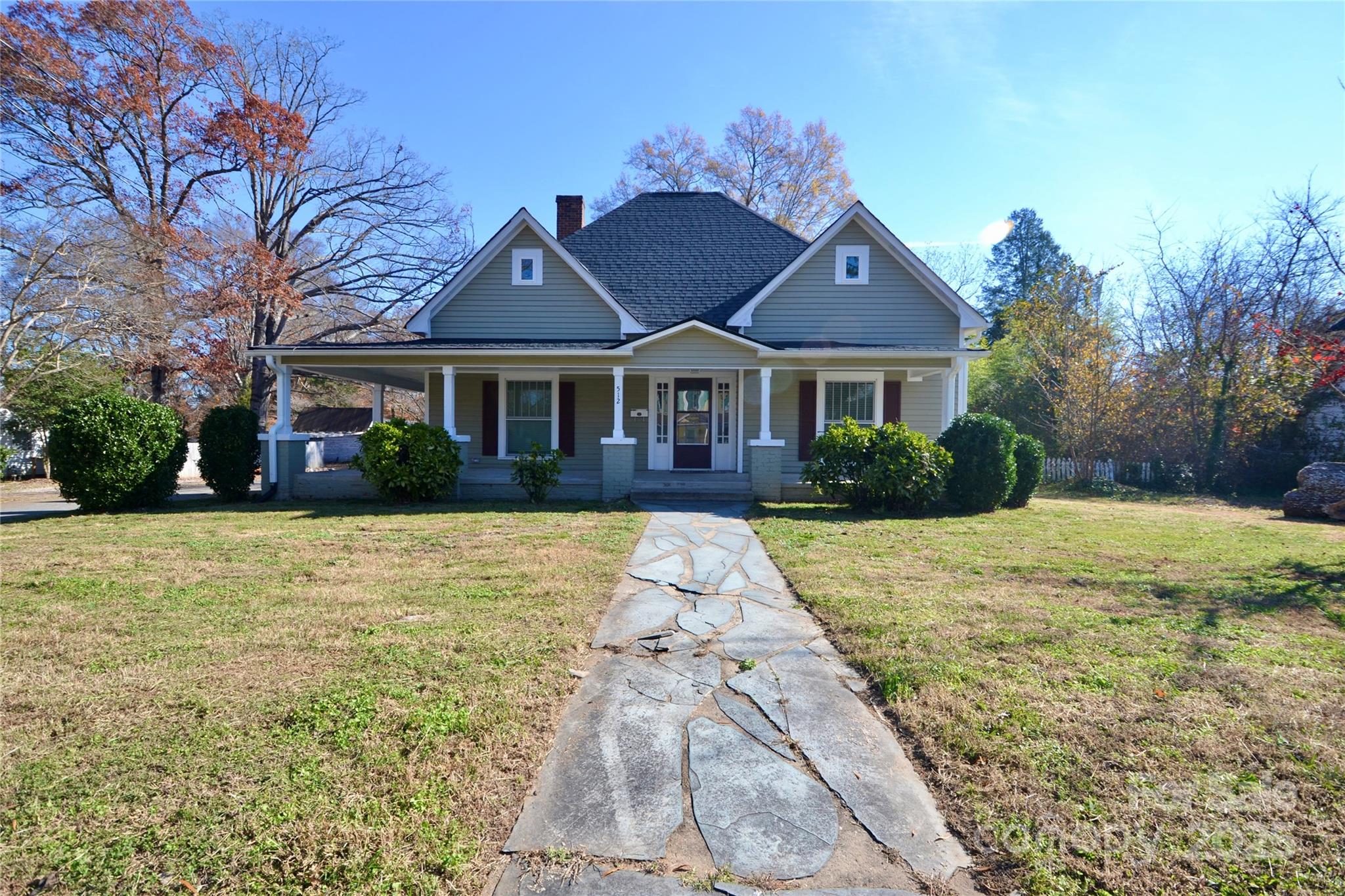 512 2nd Street Spencer, NC 28159 - Photo 2 of 33 a house with yard in front of it