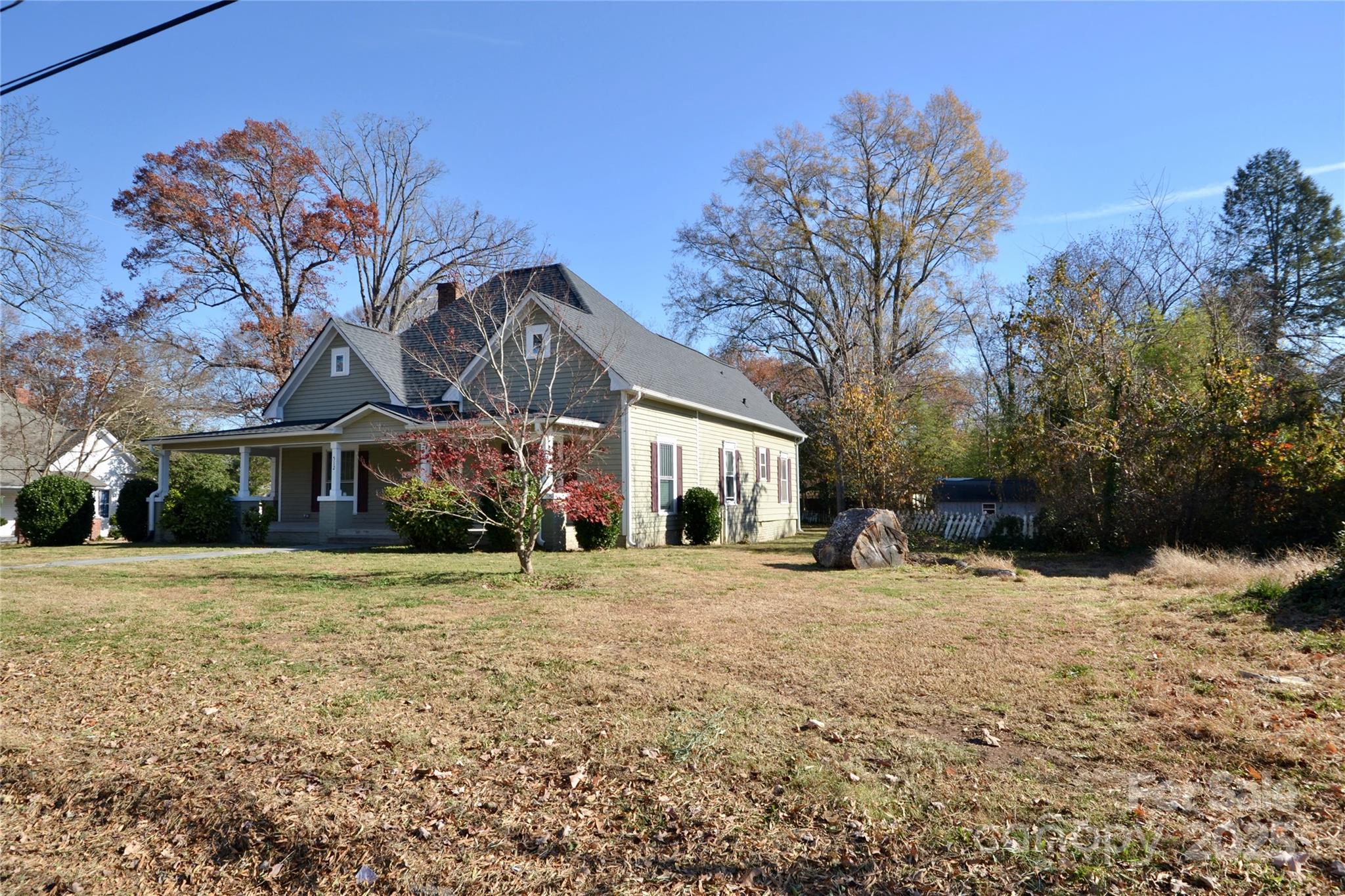 512 2nd Street Spencer, NC 28159 - Photo 31 of 33 a front view of a house with a yard covered with snow