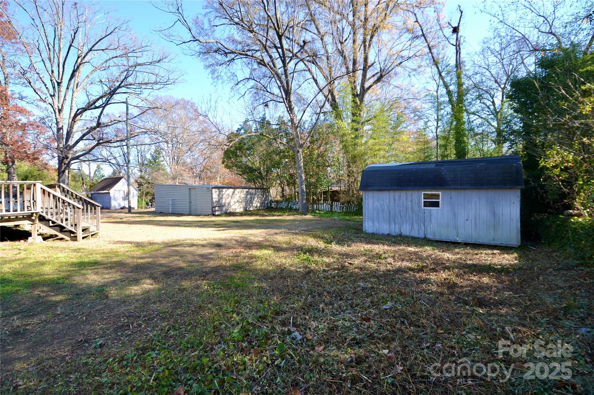 512 2nd Street Spencer, NC 28159 - Photo 32 of 33 a view of backyard with trees
