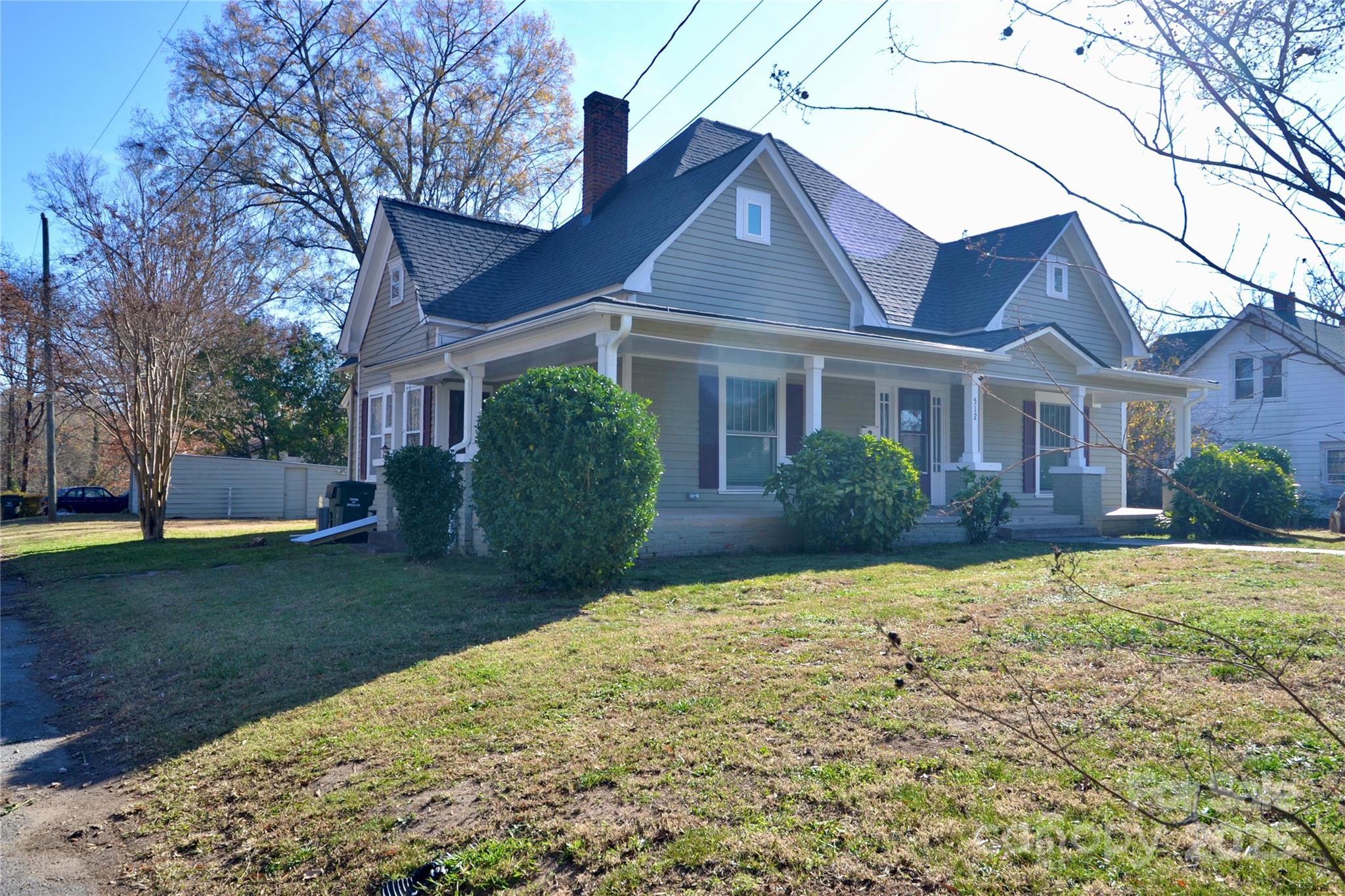 512 2nd Street Spencer, NC 28159 - Photo 4 of 33 a front view of a house with a yard