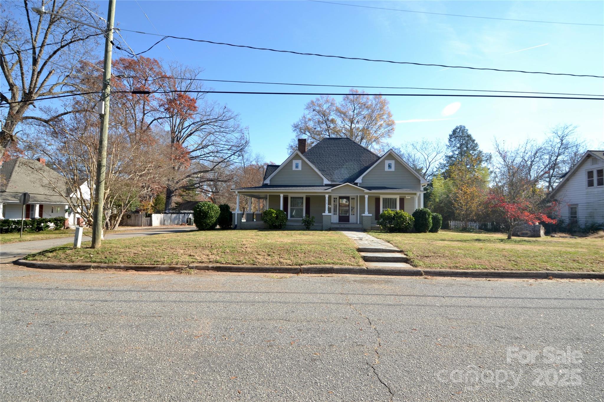 512 2nd Street Spencer, NC 28159 - Photo 5 of 33 a front view of a house with a yard