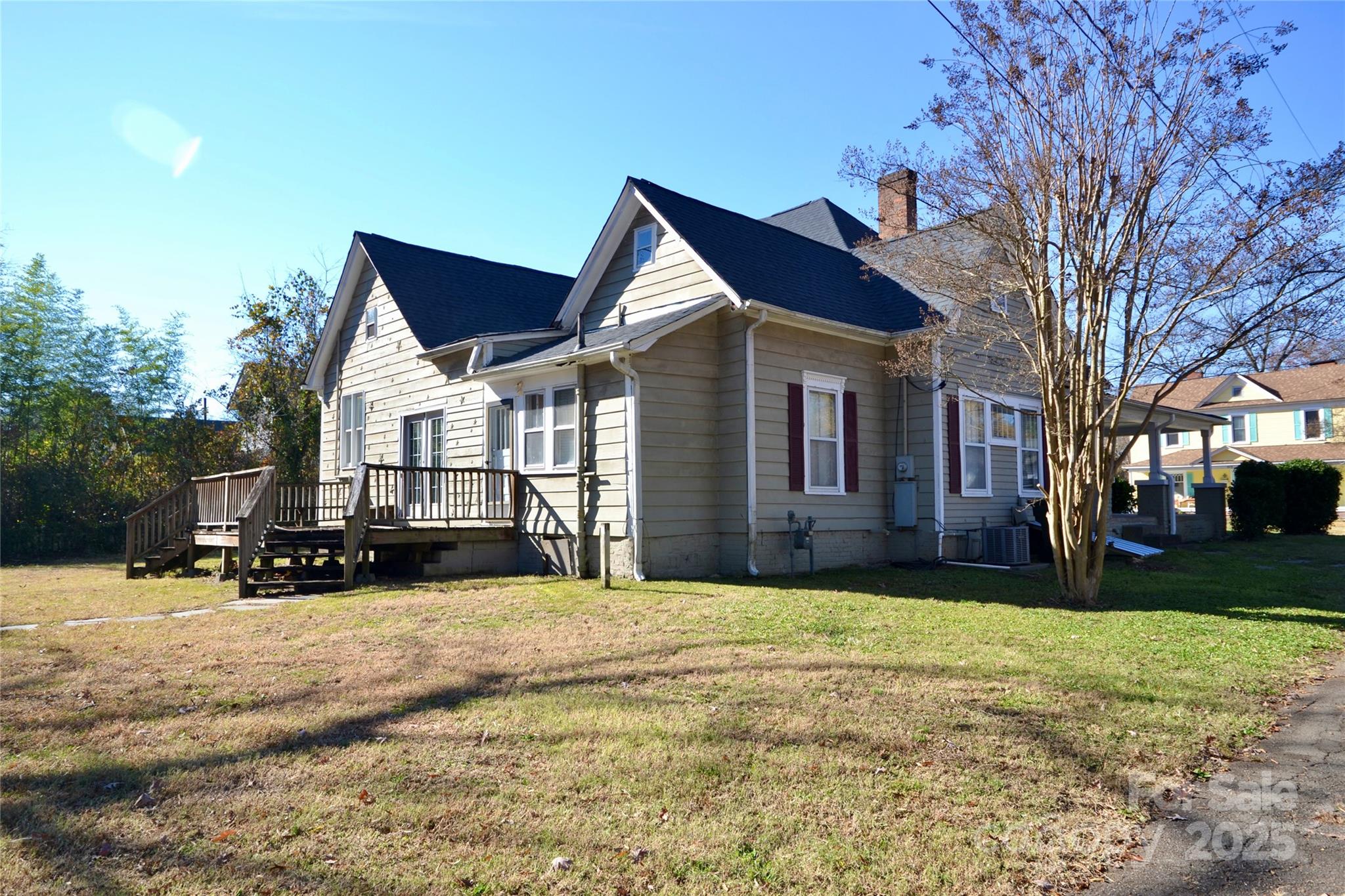 512 2nd Street Spencer, NC 28159 - Photo 6 of 33 a view of a house with a yard covered in snow
