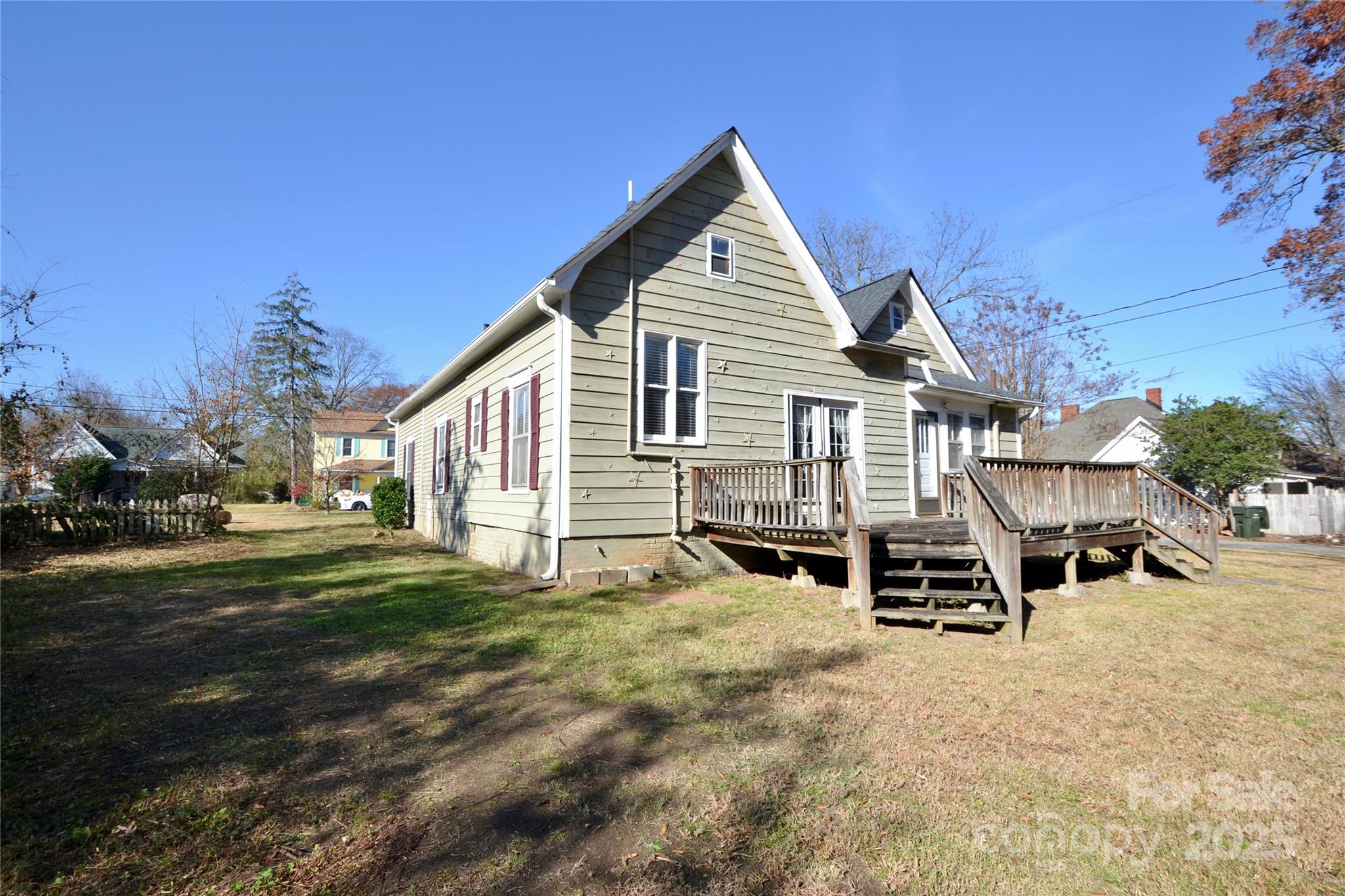 512 2nd Street Spencer, NC 28159 - Photo 8 of 33 a view of a house with a yard