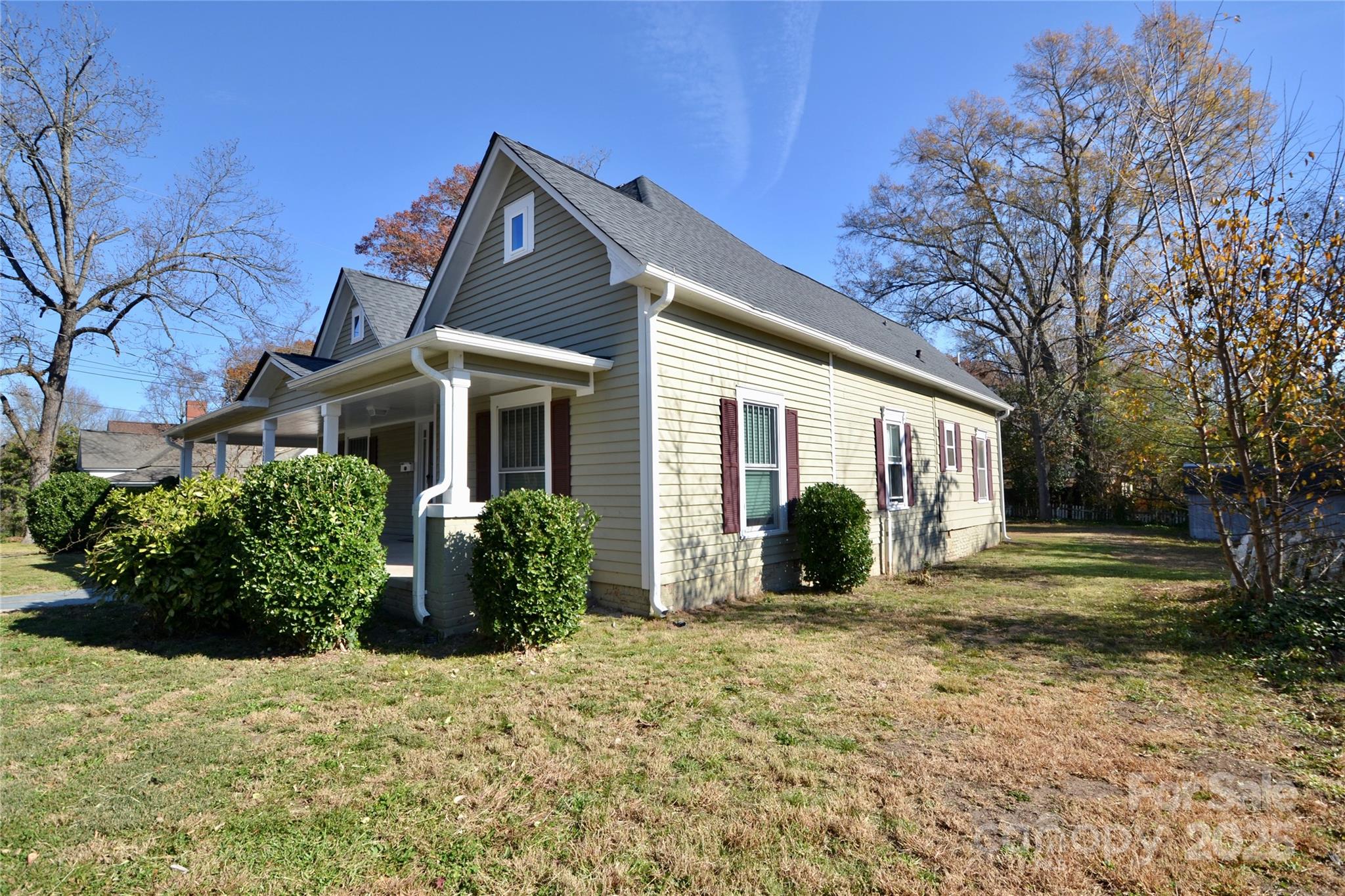 512 2nd Street Spencer, NC 28159 - Photo 9 of 33 a front view of a house with a garden