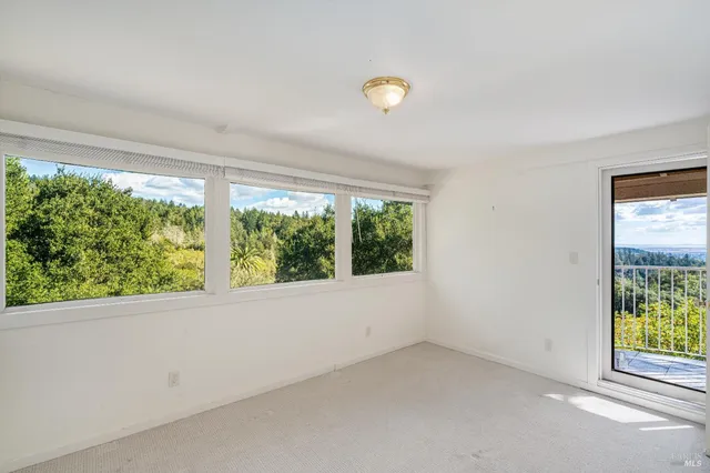 a view of a balcony with a swing
