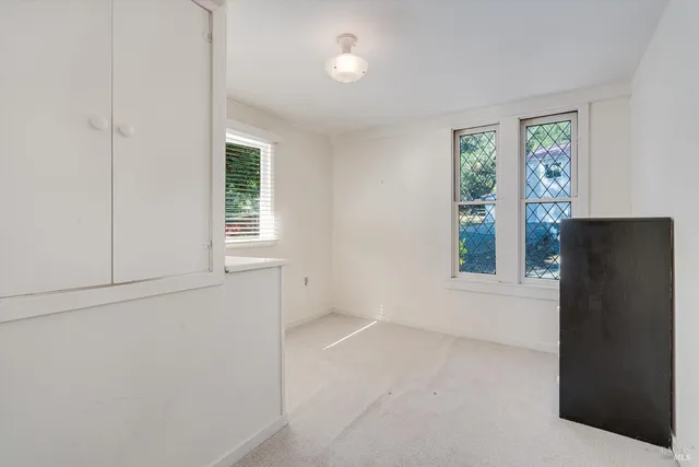 a view of an empty walk in closet