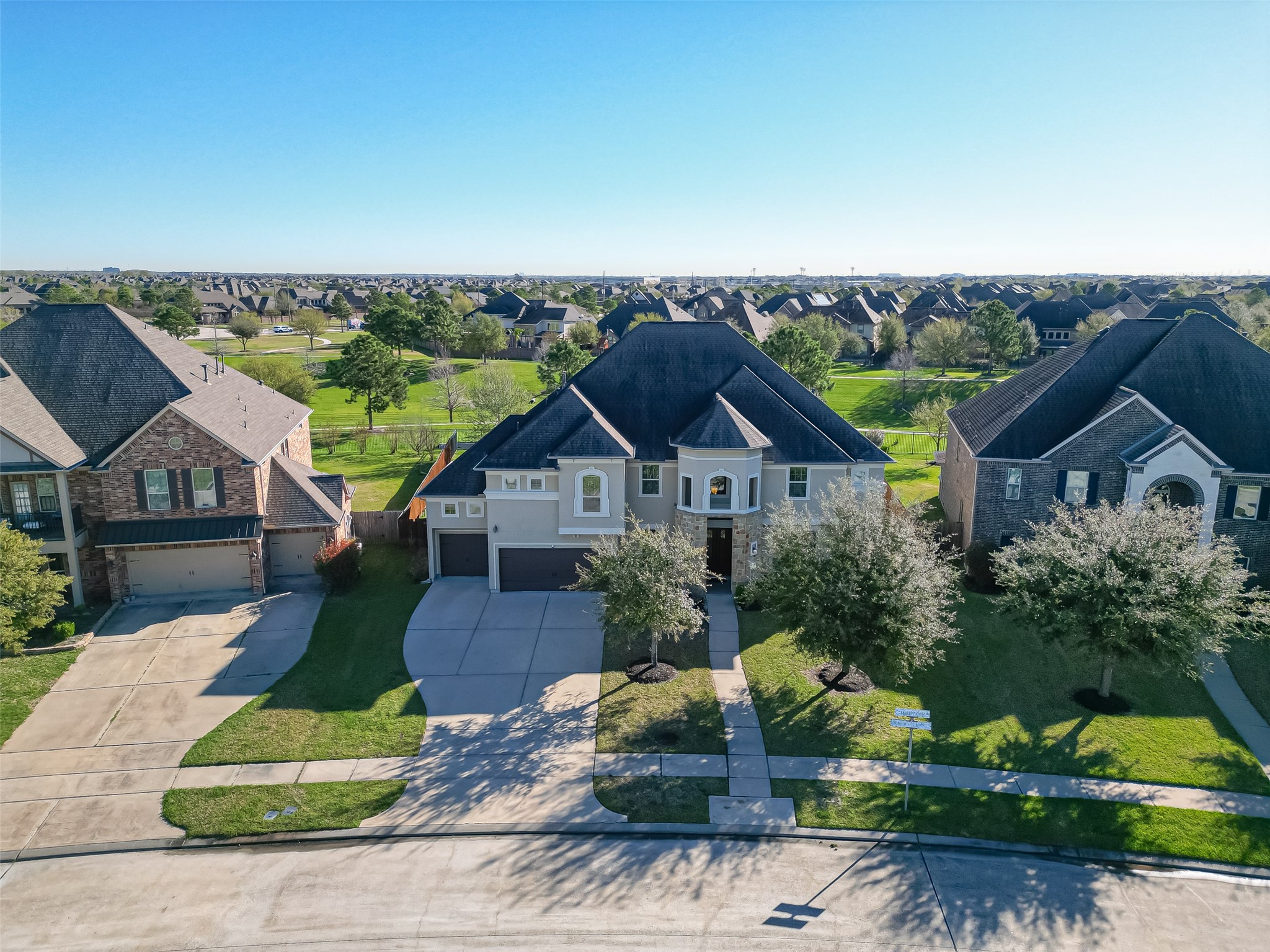 10018 Durango Path Lane Cypress, TX 77433 - Photo 3 of 50 Discover your dream home with stunning curb appeal, nestled in a lush, well-maintained neighborhood. Enjoy spacious living and serene surroundings, perfect for family-friendly living.
