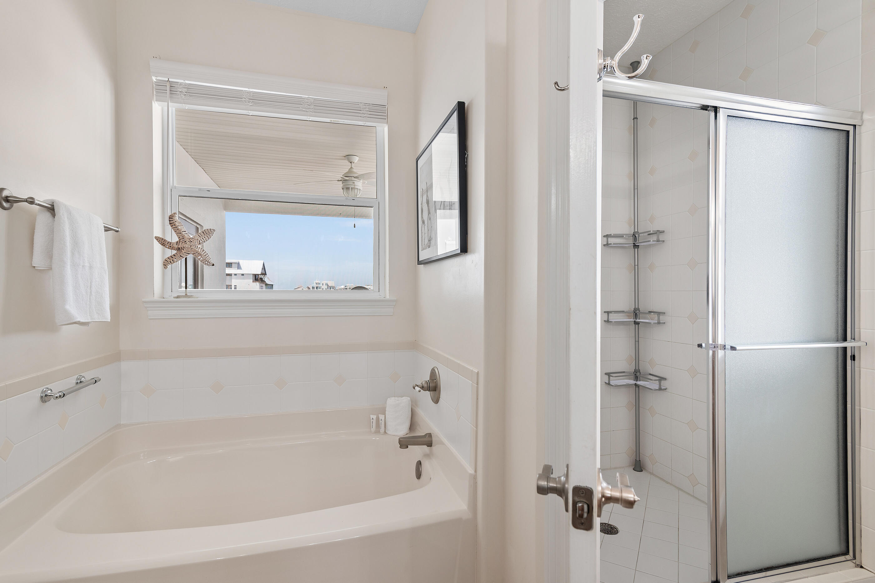 34 Beachside Drive Santa Rosa Beach, FL 32459 - Photo 28 of 65 a white bath tub sitting next to a window