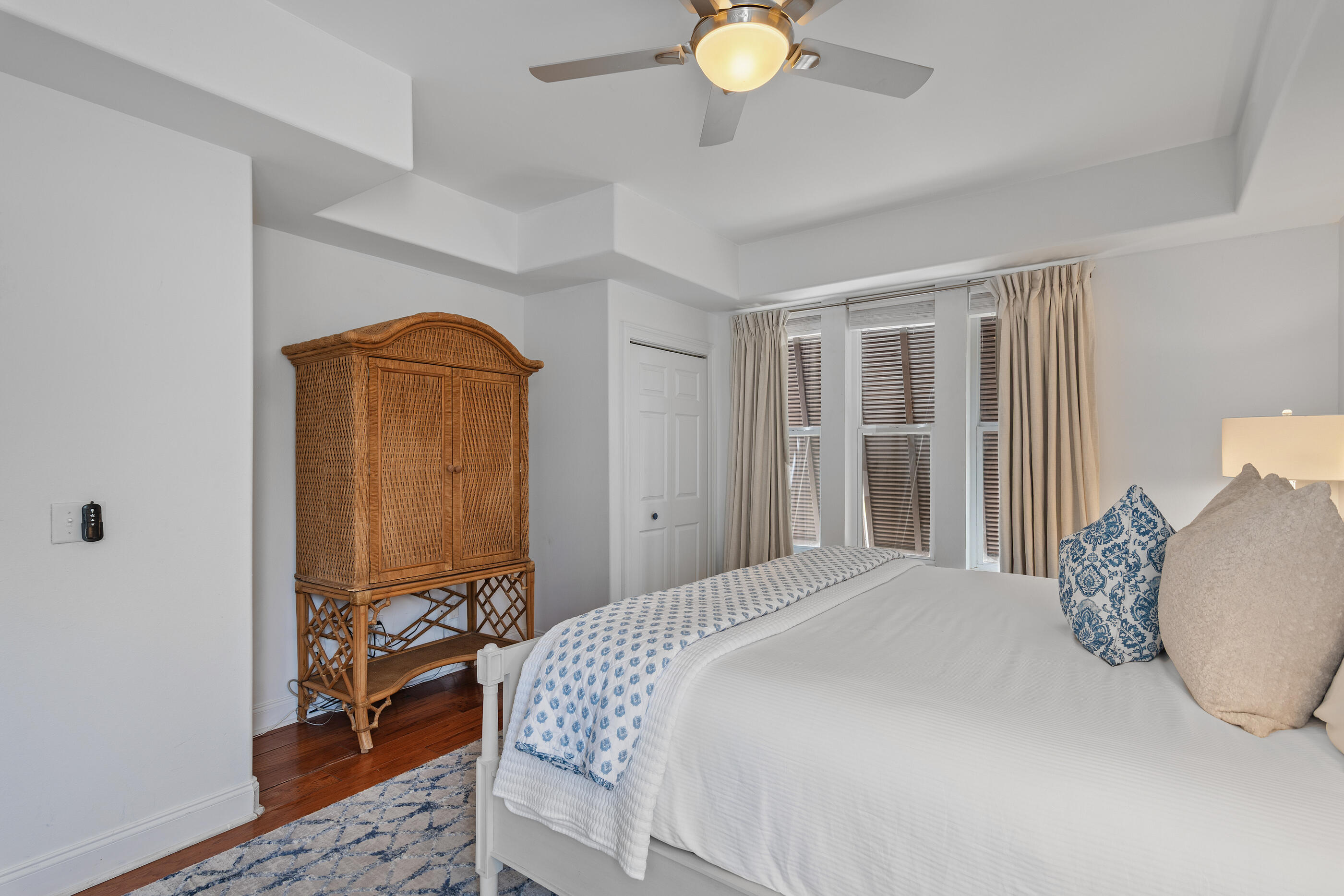 34 Beachside Drive Santa Rosa Beach, FL 32459 - Photo 37 of 65 a bedroom with a bed and wooden floor