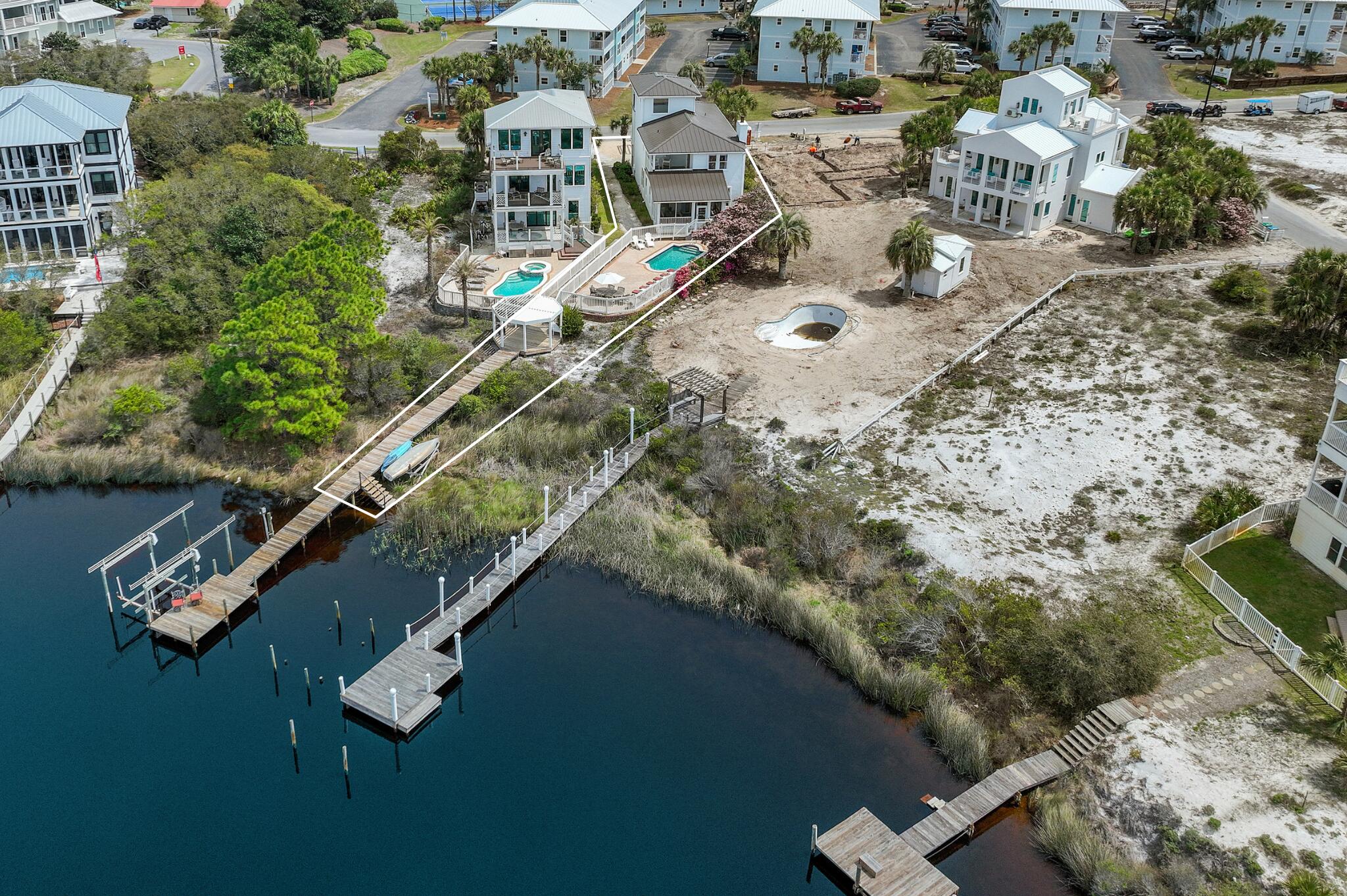 34 Beachside Drive Santa Rosa Beach, FL 32459 - Photo 47 of 65 an aerial view of a residential houses with outdoor space
