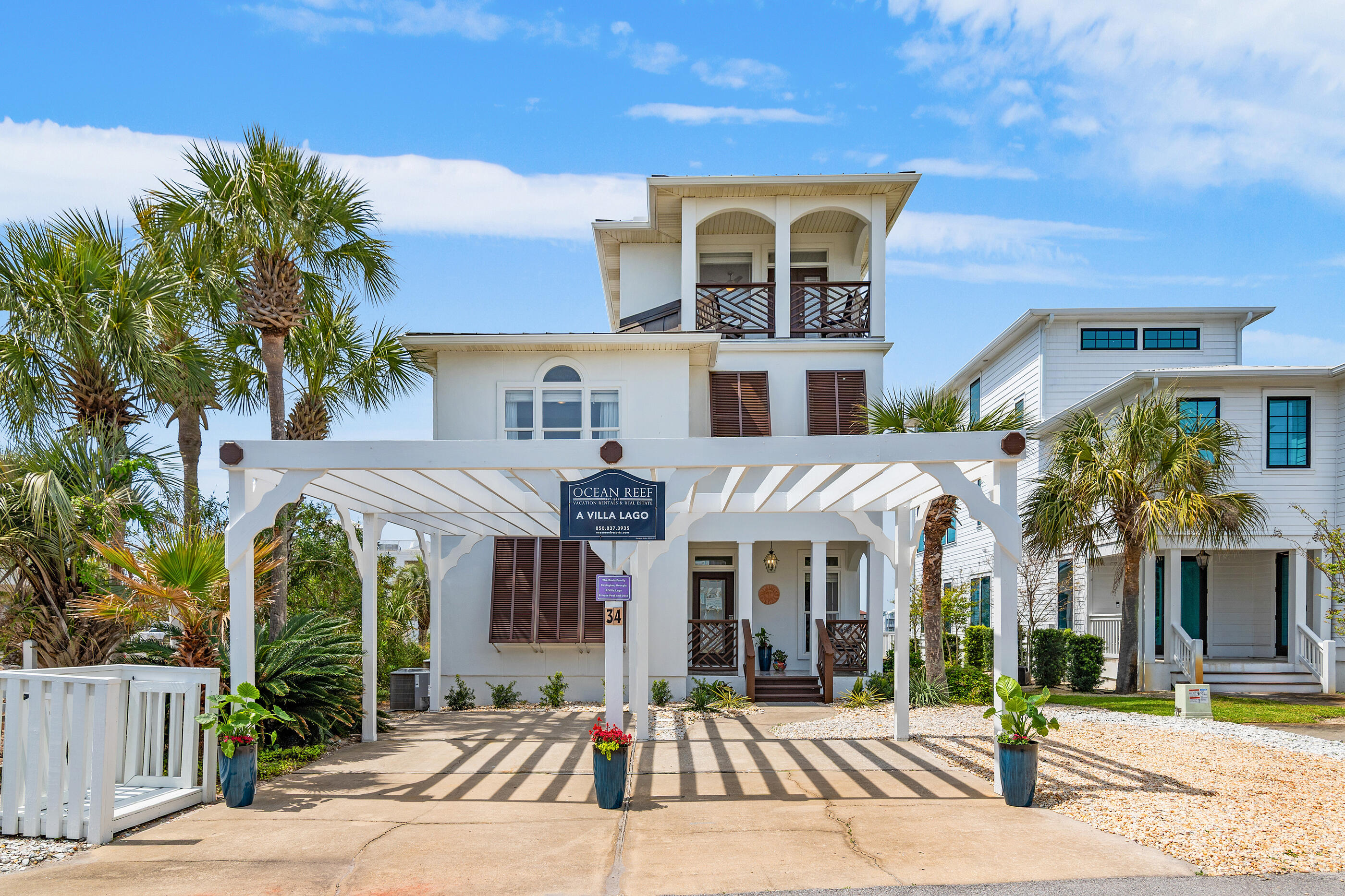 34 Beachside Drive Santa Rosa Beach, FL 32459 - Photo 5 of 65 a front view of a building with street view