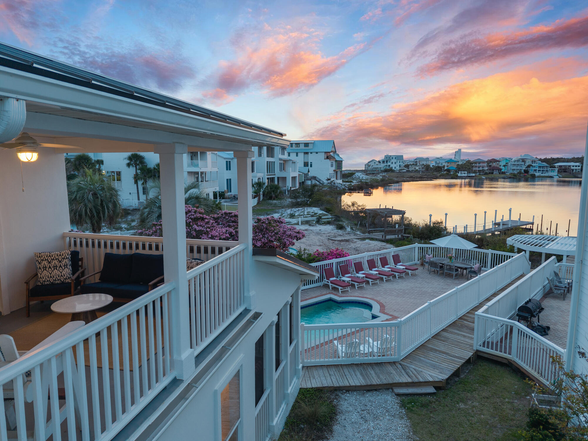 34 Beachside Drive Santa Rosa Beach, FL 32459 - Photo 65 of 65 a view of a balcony with two chairs