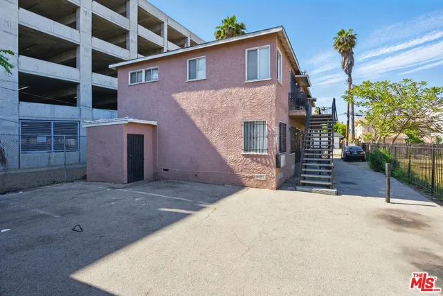 a view of a house with a street