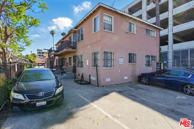 a car parked in front of a house