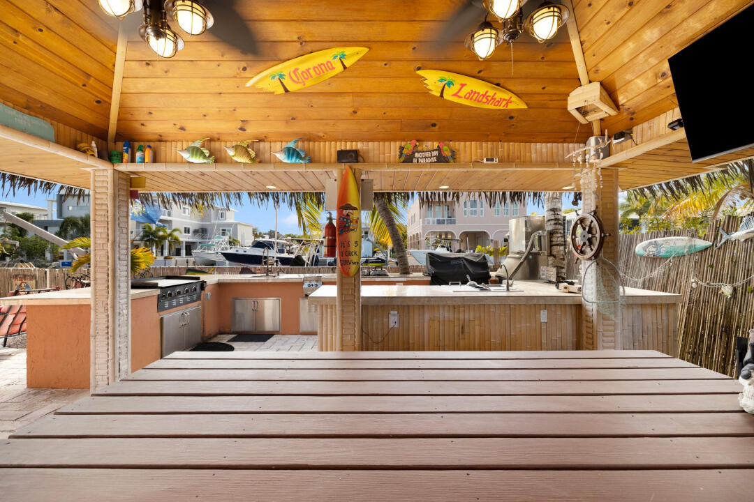 23 South Exuma Road Key Largo, FL 33037 - Photo 6 of 24 a view of a living room with a wooden floor