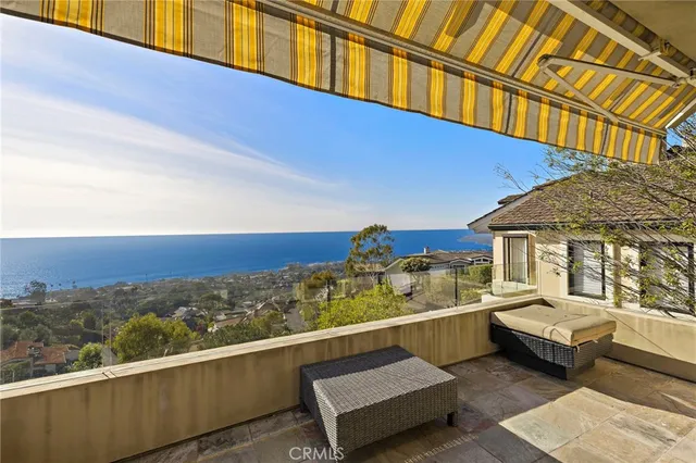 a spacious bathroom with a double vanity sink and a mirror