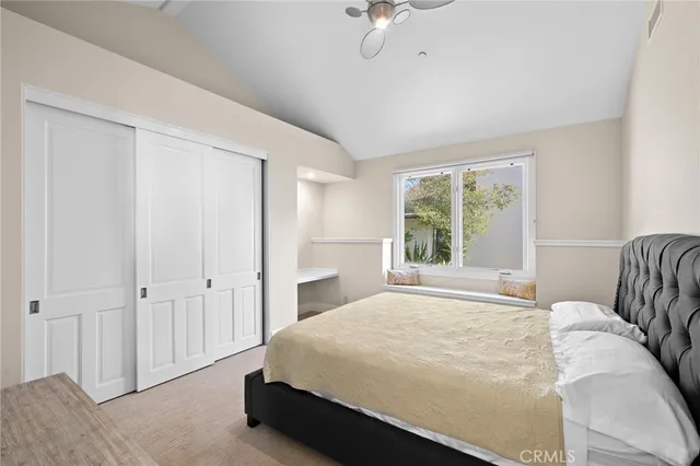 a bathroom with a sink vanity toilet and shower