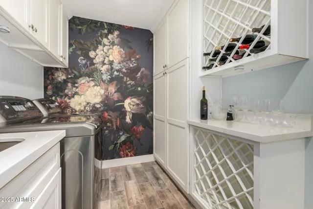 a bedroom with a bed and cabinets