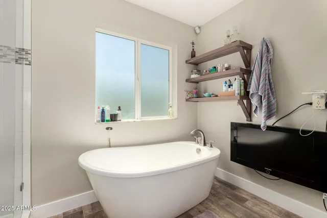 a view of an empty room with a window