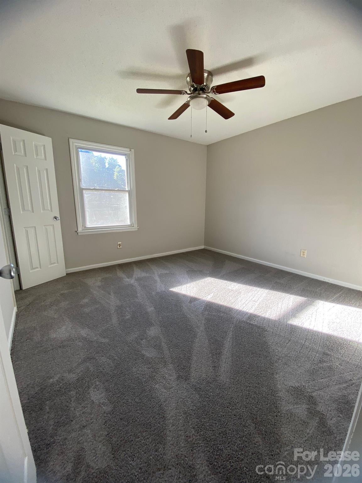 900 Junius Street, Unit A Gastonia, NC 28052 - Photo 9 of 10 a view of a big room with carpet