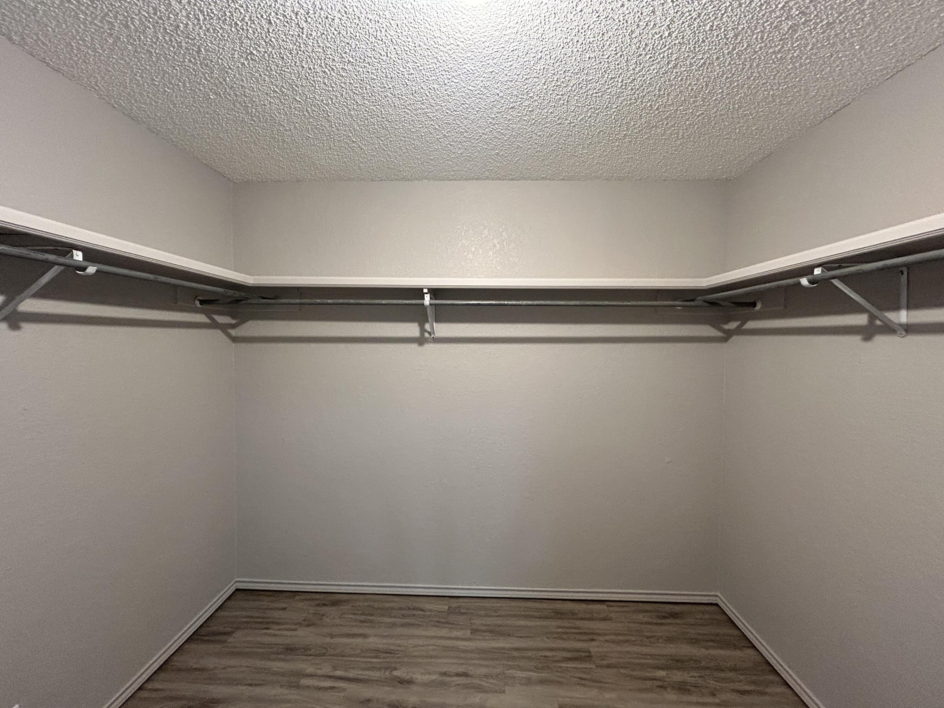 5517 89th Street Lubbock, TX 79424 - Photo 13 of 20 a view of an empty walk in closet