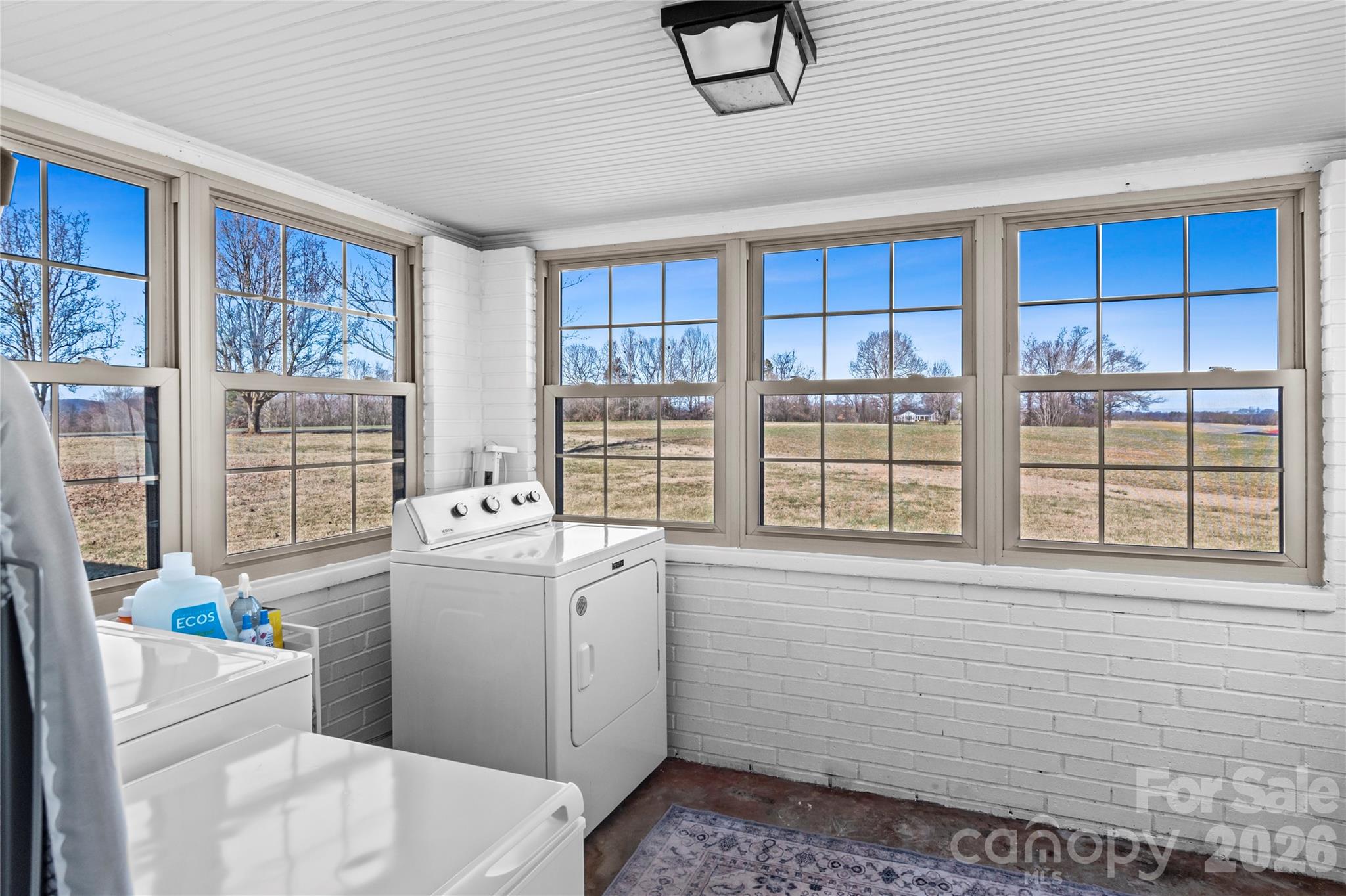 2432 Holcomb Road Yadkinville, NC 27055 - Photo 17 of 37 a utility room with dryer and washer