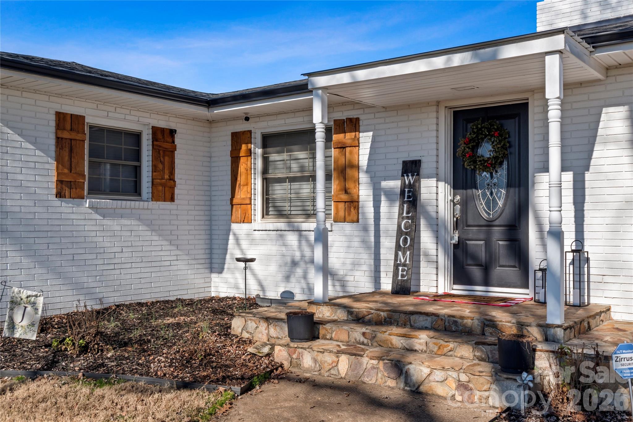 2432 Holcomb Road Yadkinville, NC 27055 - Photo 6 of 37 a front view of a house