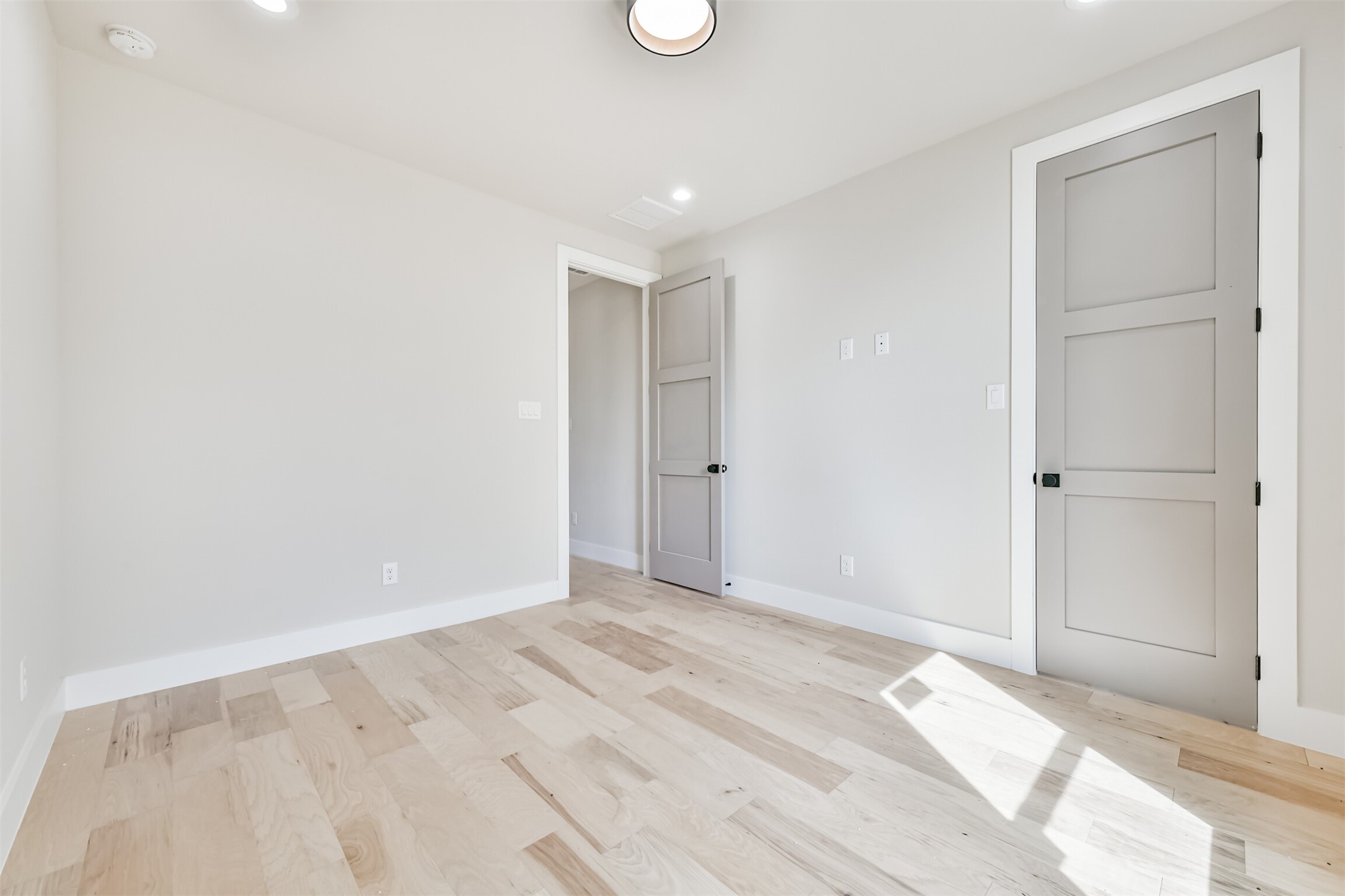 250 Pony Trail Angleton, TX 77515 - Photo 18 of 32 Spacious and bright third bedroom, perfect for comfort and versatility.
