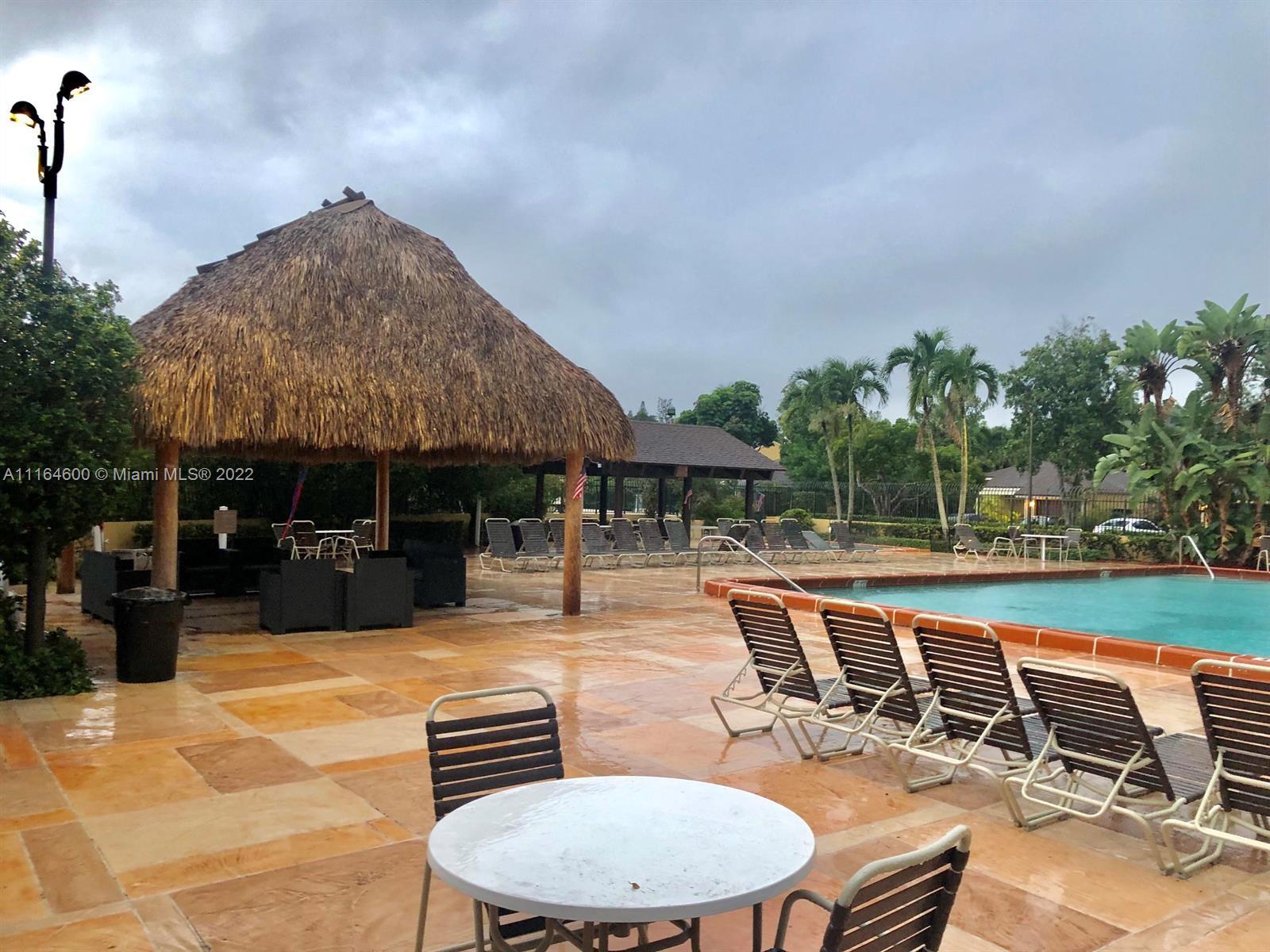 11608 Timbers Way Boca Raton, FL 33428 - Photo 54 of 55 a view of a patio with swimming pool
