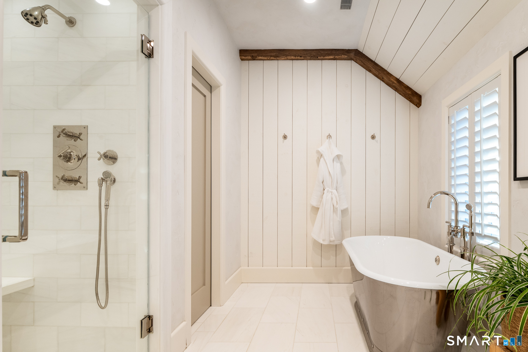 16 Juniper Road Norwalk, CT 06853 - Photo 20 of 30 a bathroom with a shower and a sink