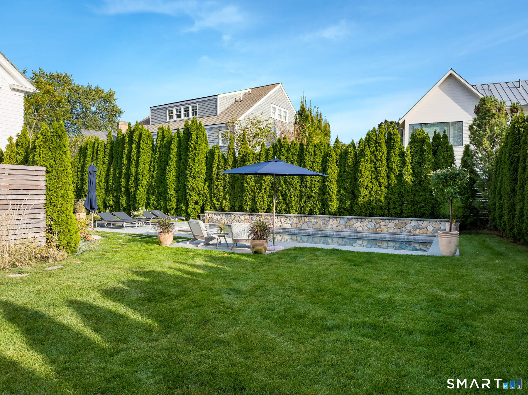 16 Juniper Road Norwalk, CT 06853 - Photo 7 of 30 a view of a garden