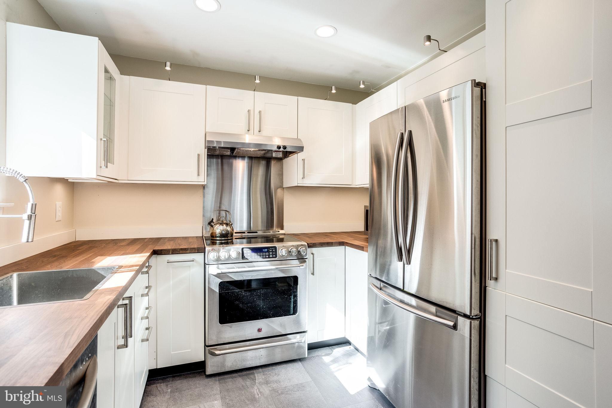 1911 Villaridge Drive, Unit A Reston, VA 20191 - Photo 11 of 35 Stainless appliances and new cabinets