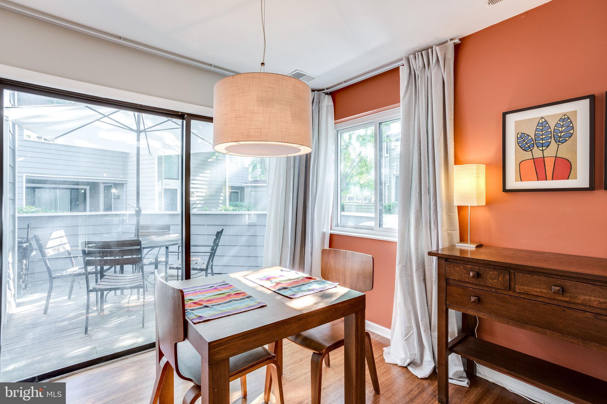 1911 Villaridge Drive, Unit A Reston, VA 20191 - Photo 13 of 35 Dining room opens to patio