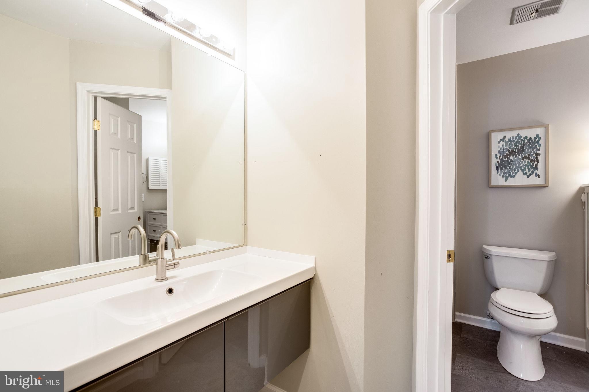 1911 Villaridge Drive, Unit A Reston, VA 20191 - Photo 24 of 35 Separate and updated vanity in master bedroom