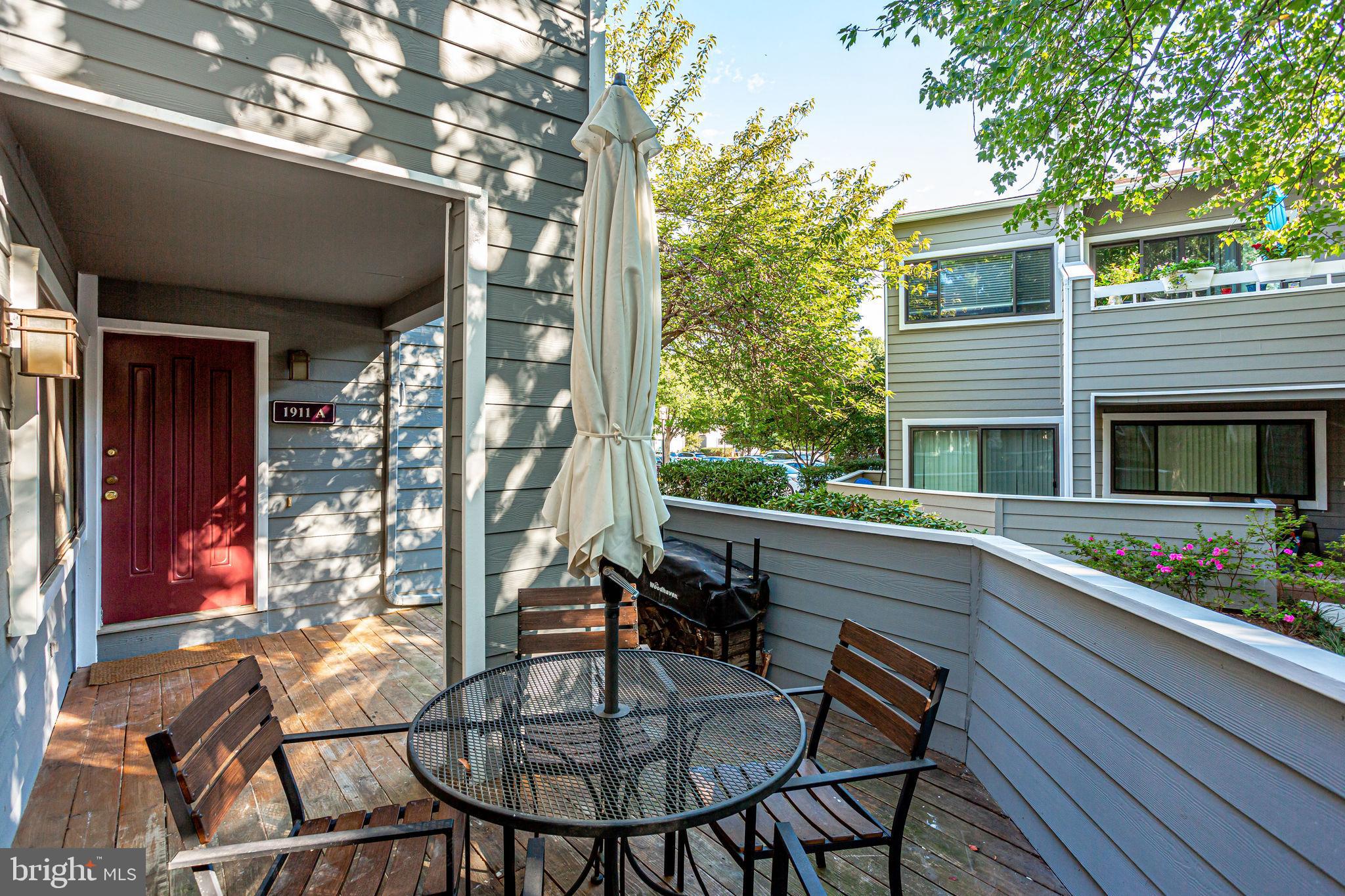 1911 Villaridge Drive, Unit A Reston, VA 20191 - Photo 26 of 35 Large patio with seating and shade