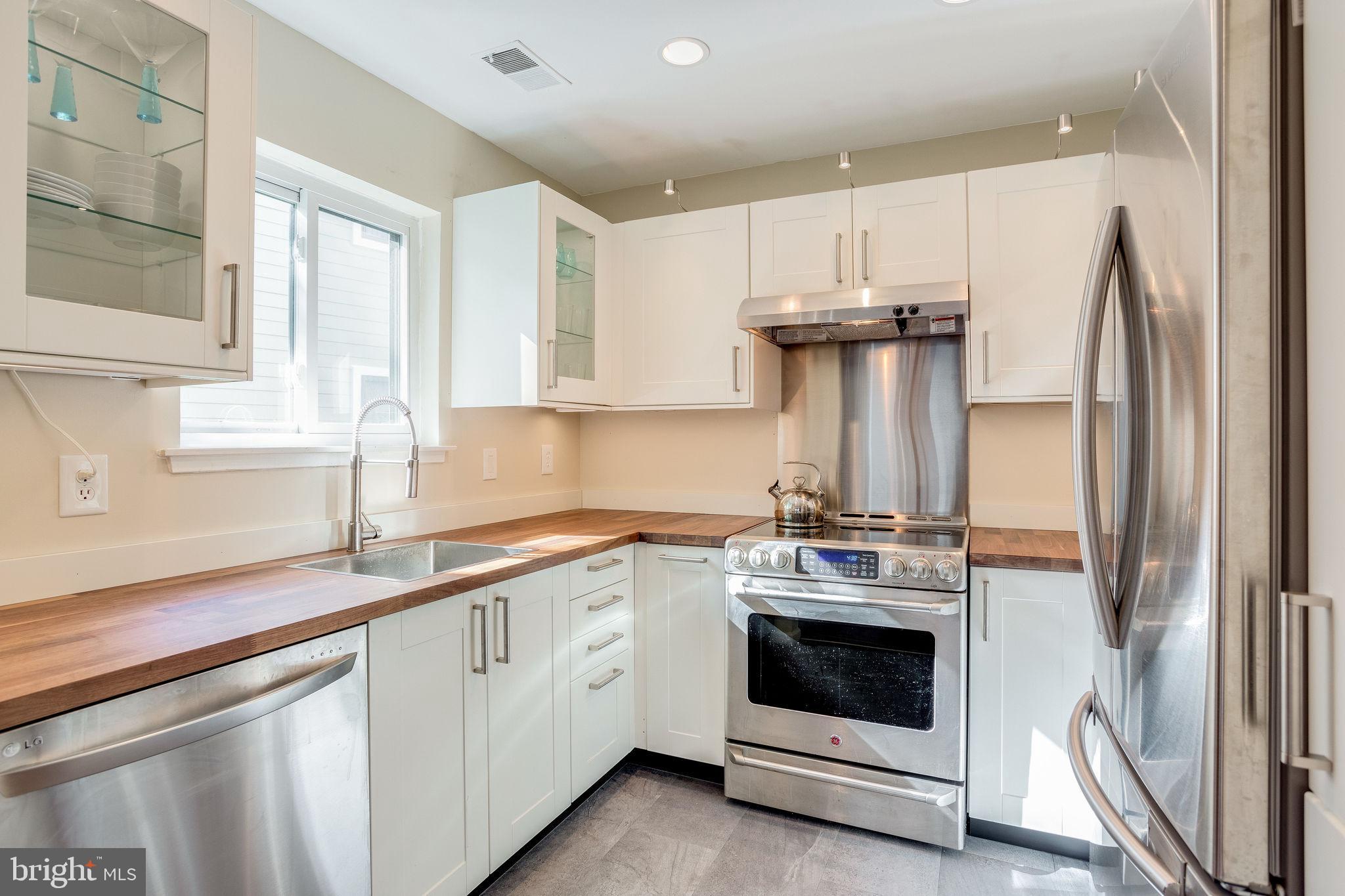 1911 Villaridge Drive, Unit A Reston, VA 20191 - Photo 9 of 35 Updated and gorgeous kitchen