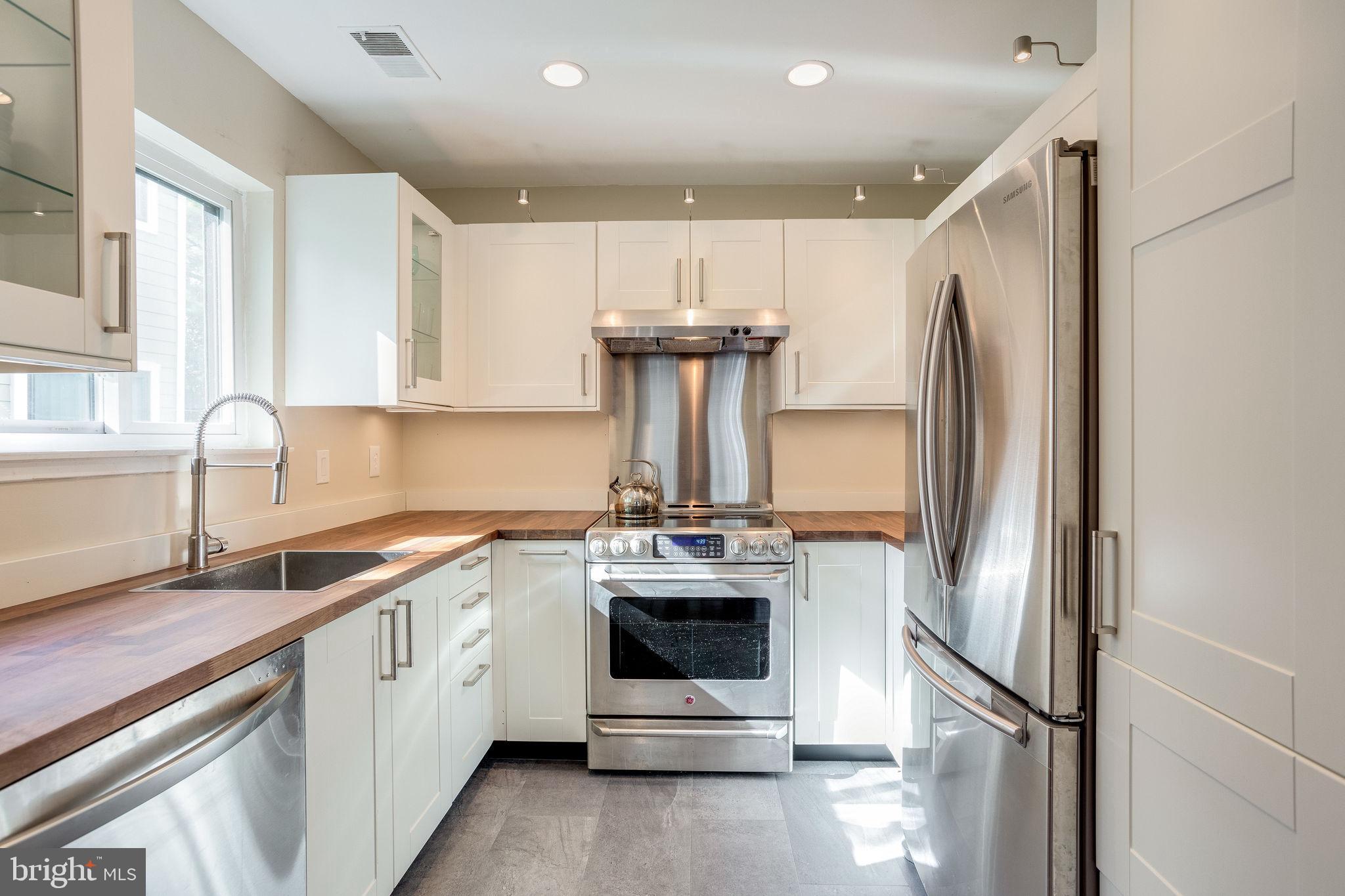 1911 Villaridge Drive, Unit A Reston, VA 20191 - Photo 10 of 35 Large window and a pantry