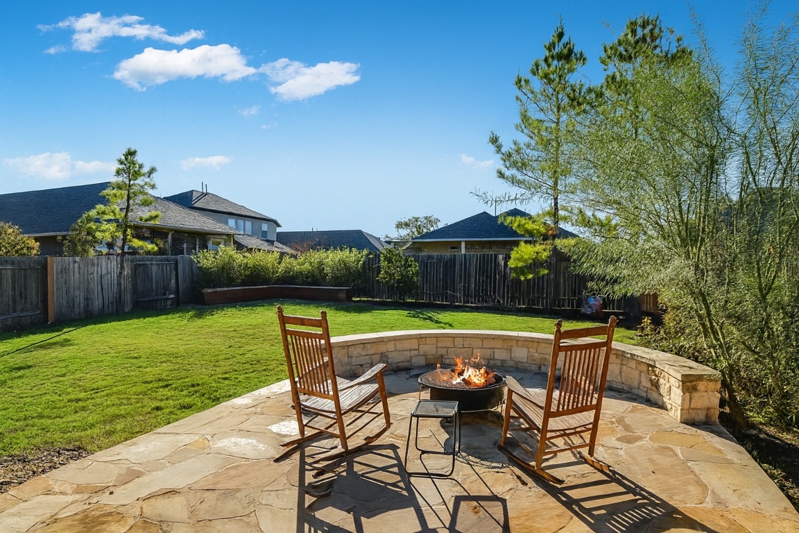 541 Cortona Lane Georgetown, TX 78628 - Photo 16 of 19 a swimming pool with outdoor seating and yard