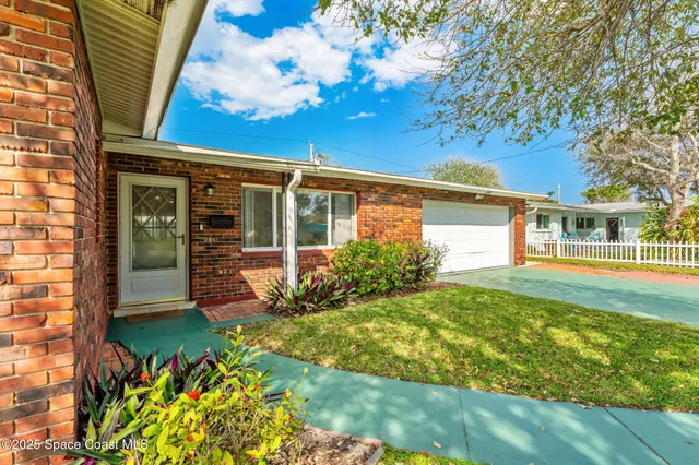 a view of a backyard with garden