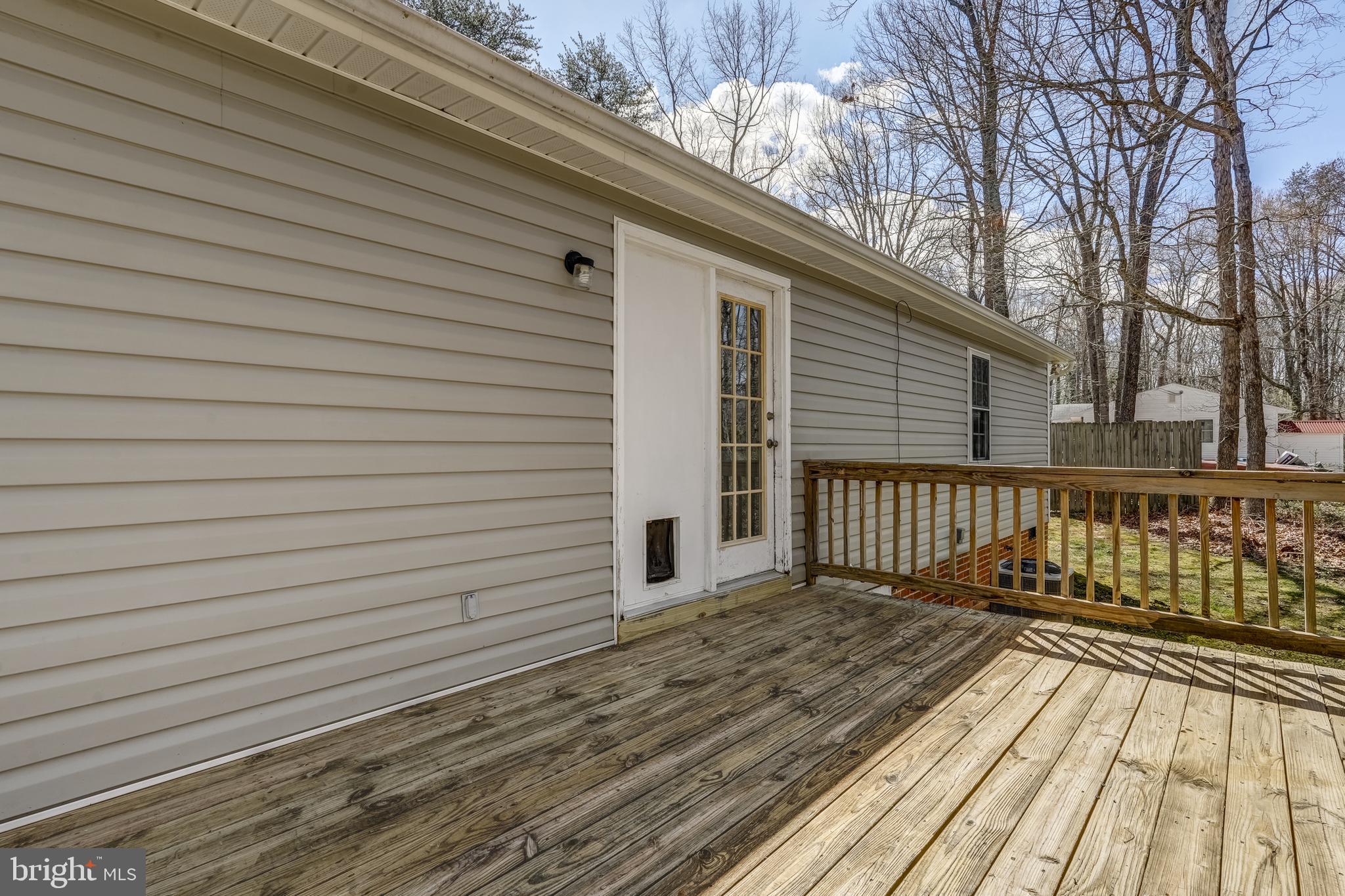 6021 Ridge Road Columbia, VA 23038 - Photo 13 of 40 a view of a wooden deck