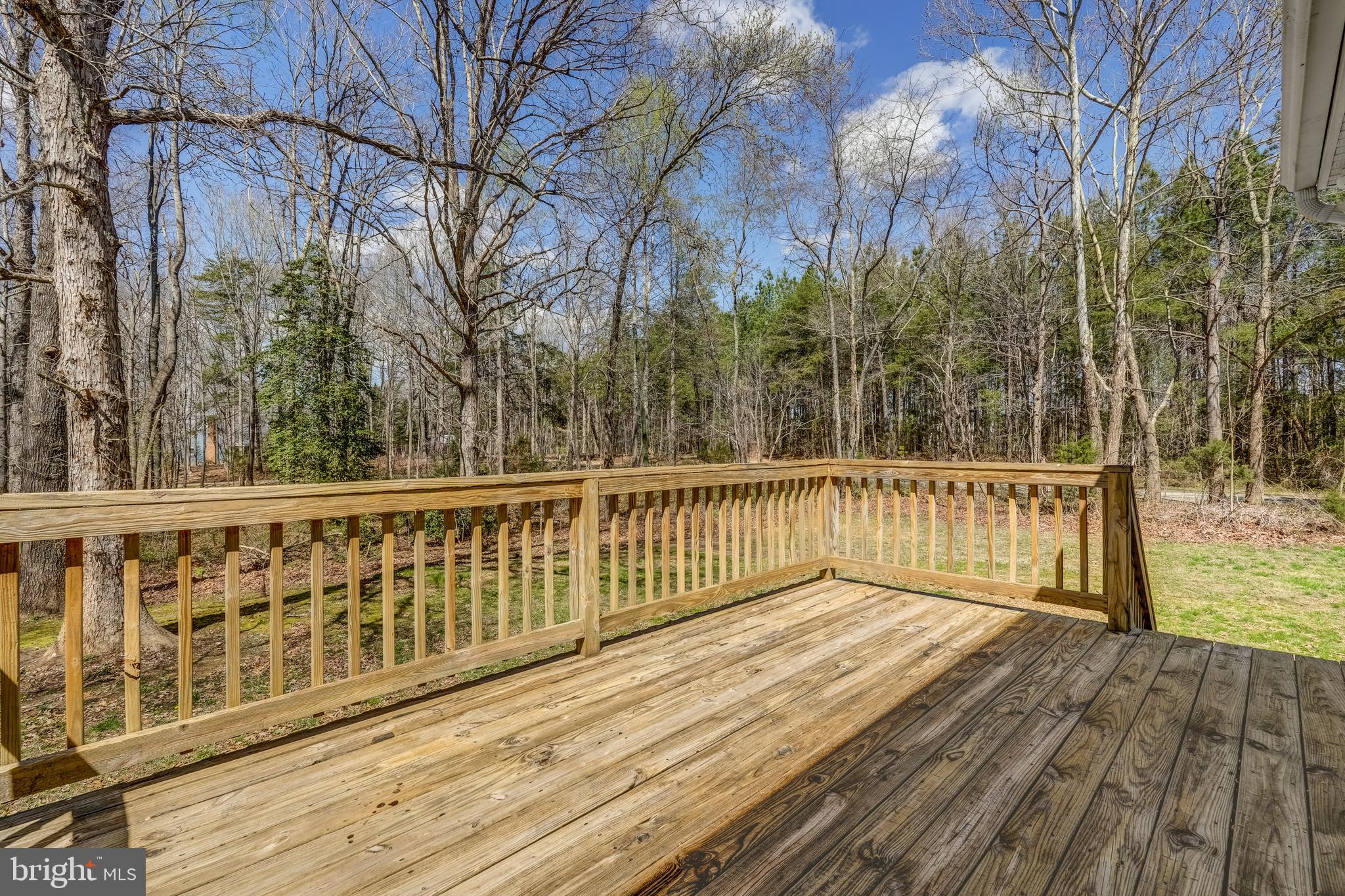 6021 Ridge Road Columbia, VA 23038 - Photo 15 of 40 a view of balcony with wooden floor and fence