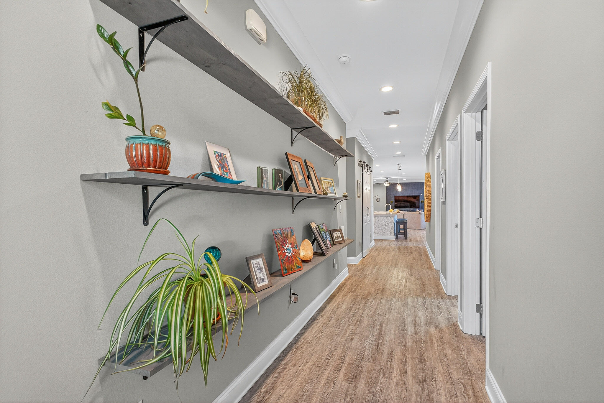 61 B 6th Street Shalimar, FL 32579 - Photo 12 of 59 a hallway with a dining table and chairs