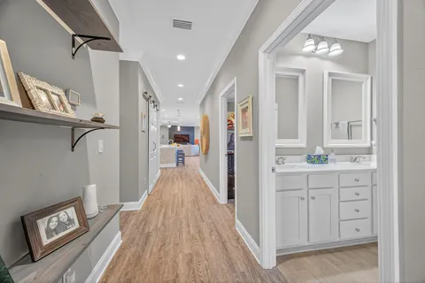 a view of a bedroom from a hallway