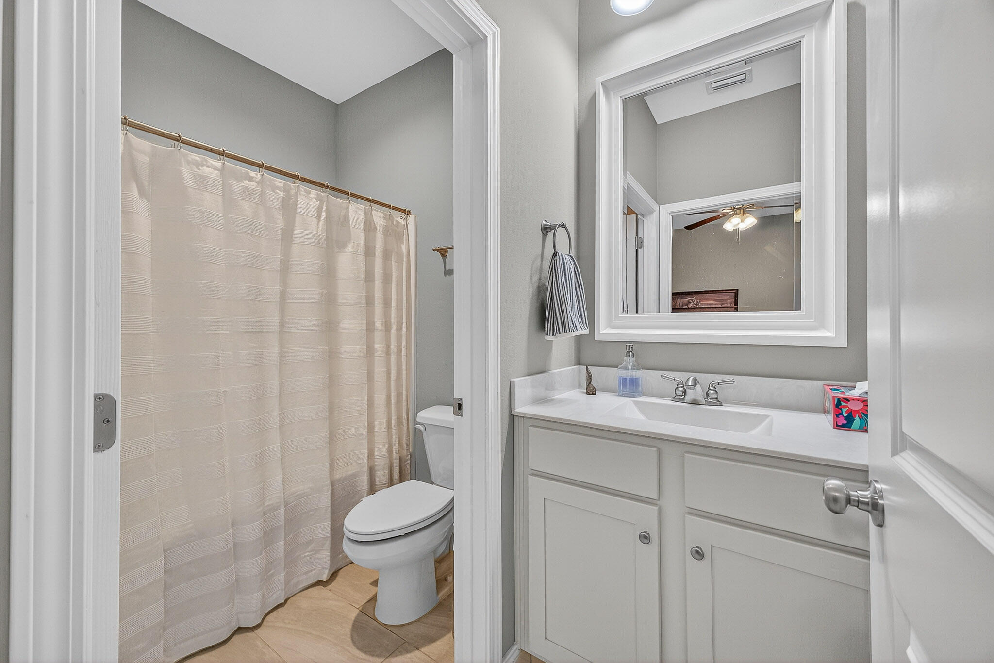 61 B 6th Street Shalimar, FL 32579 - Photo 22 of 59 a bathroom with a sink a toilet and shower