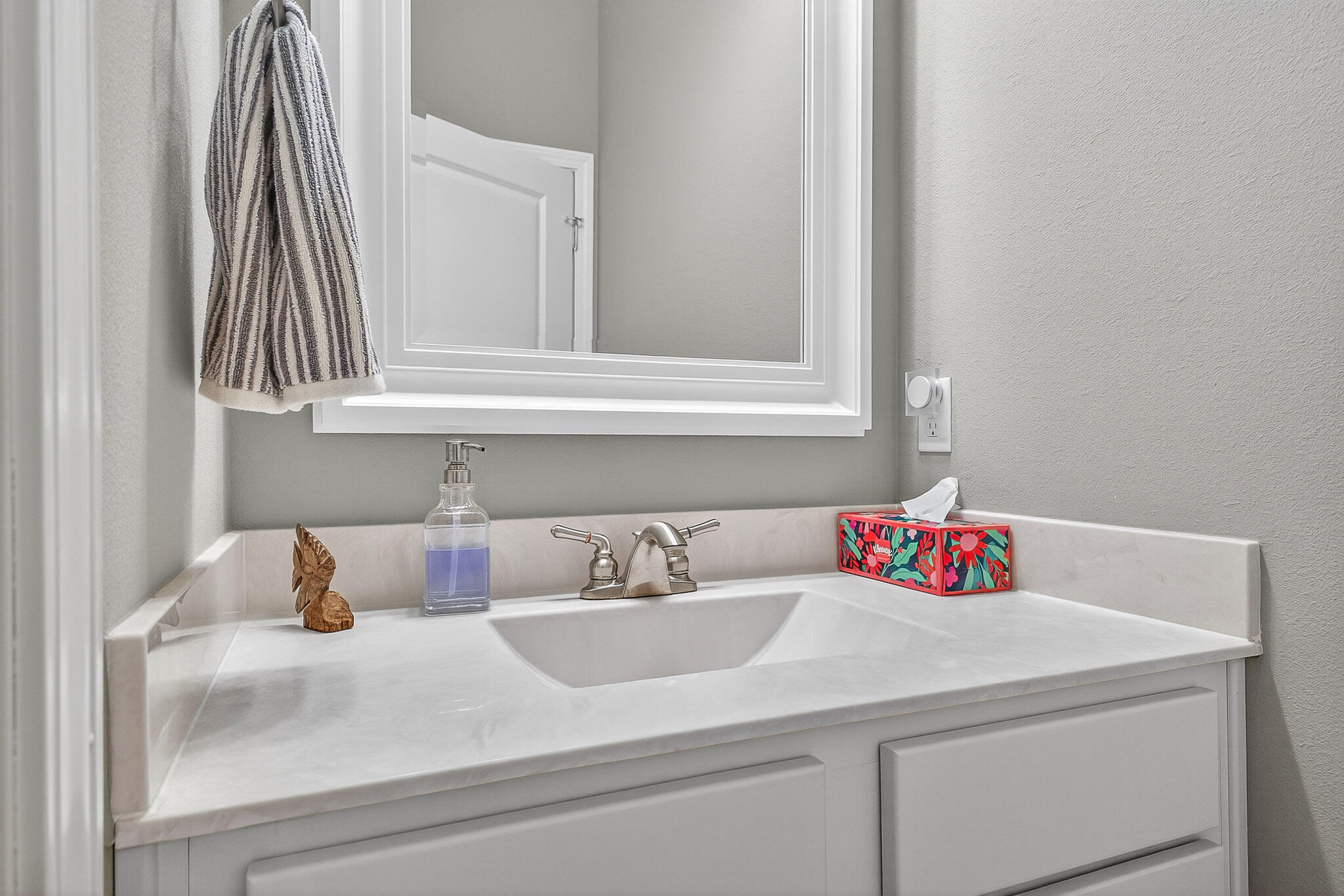 61 B 6th Street Shalimar, FL 32579 - Photo 23 of 59 a bathroom with a sink and a window