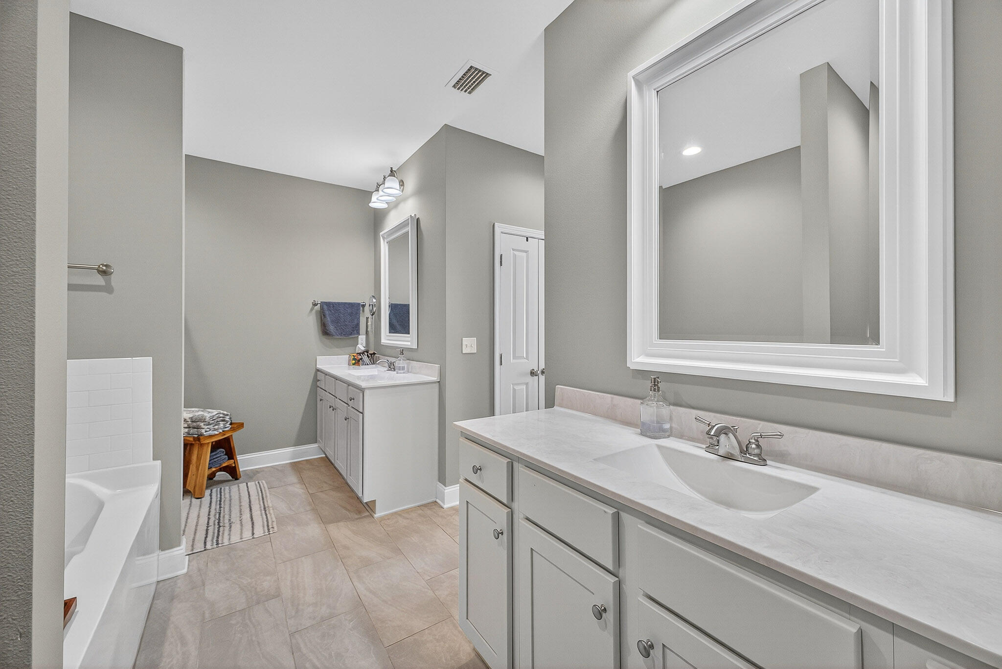 61 B 6th Street Shalimar, FL 32579 - Photo 32 of 59 a bathroom with a sink and a mirror