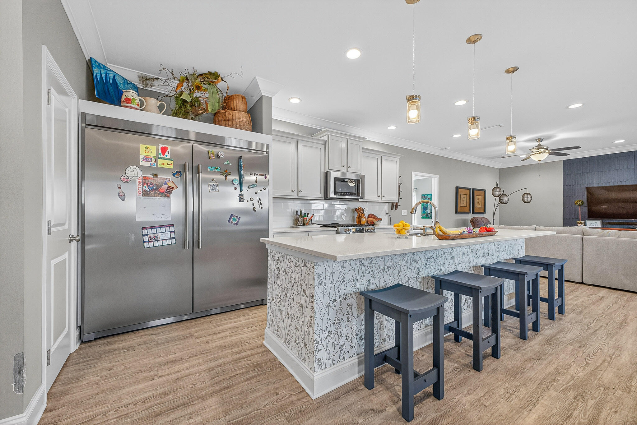 61 B 6th Street Shalimar, FL 32579 - Photo 34 of 59 a kitchen with stainless steel appliances granite countertop a refrigerator and a dining table