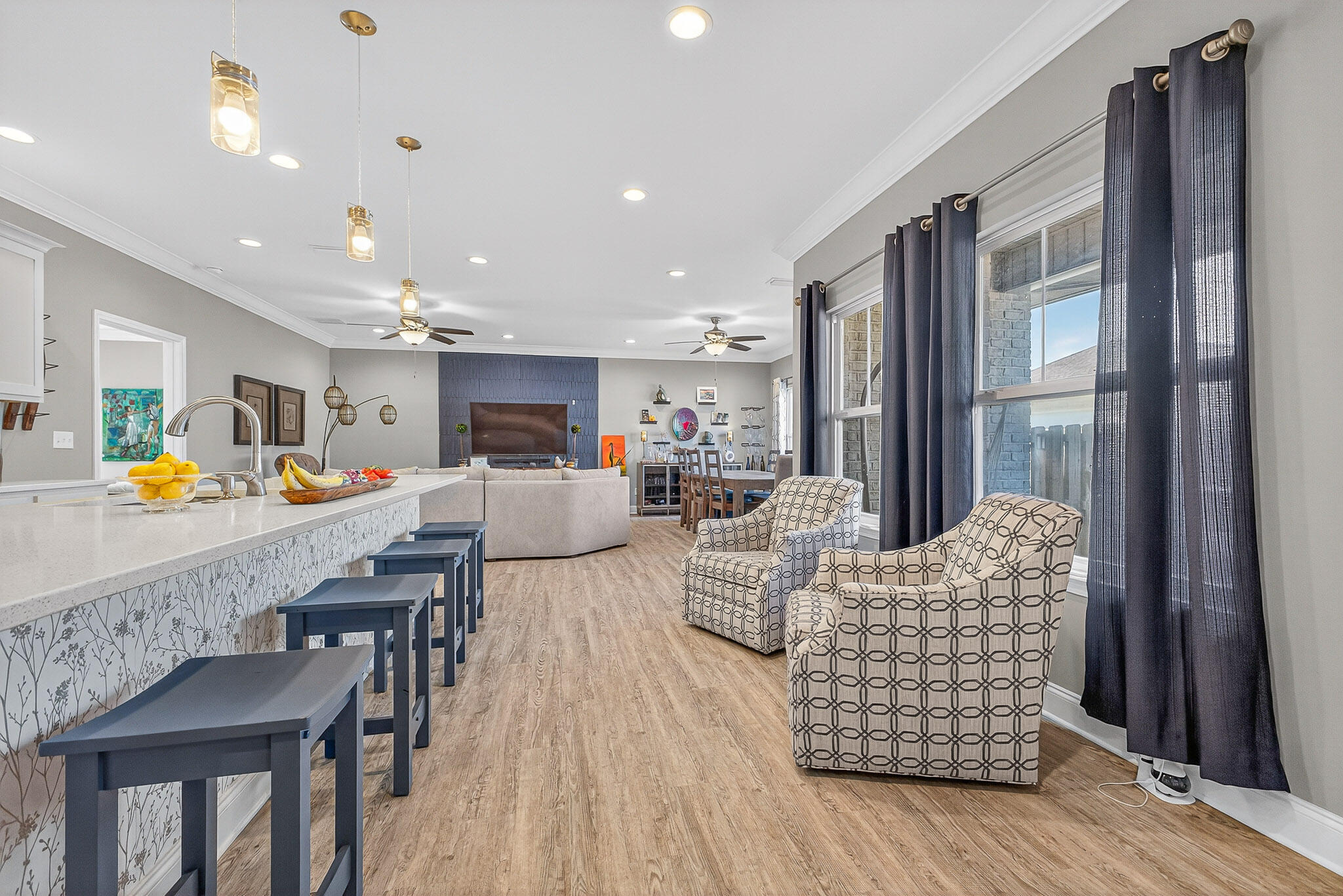 61 B 6th Street Shalimar, FL 32579 - Photo 35 of 59 a living room with furniture kitchen view and a large window