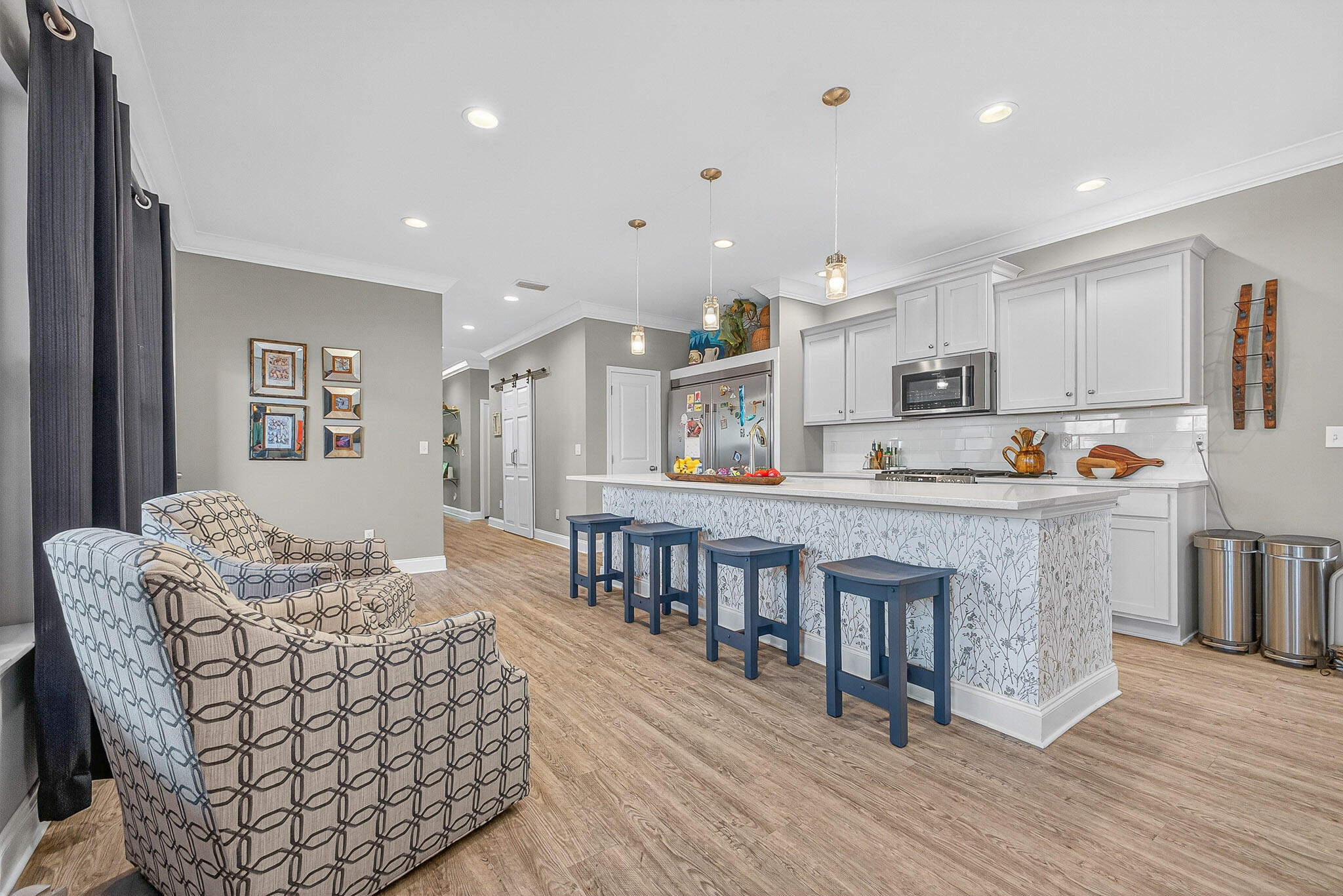 61 B 6th Street Shalimar, FL 32579 - Photo 37 of 59 a living room with furniture and a wooden floor